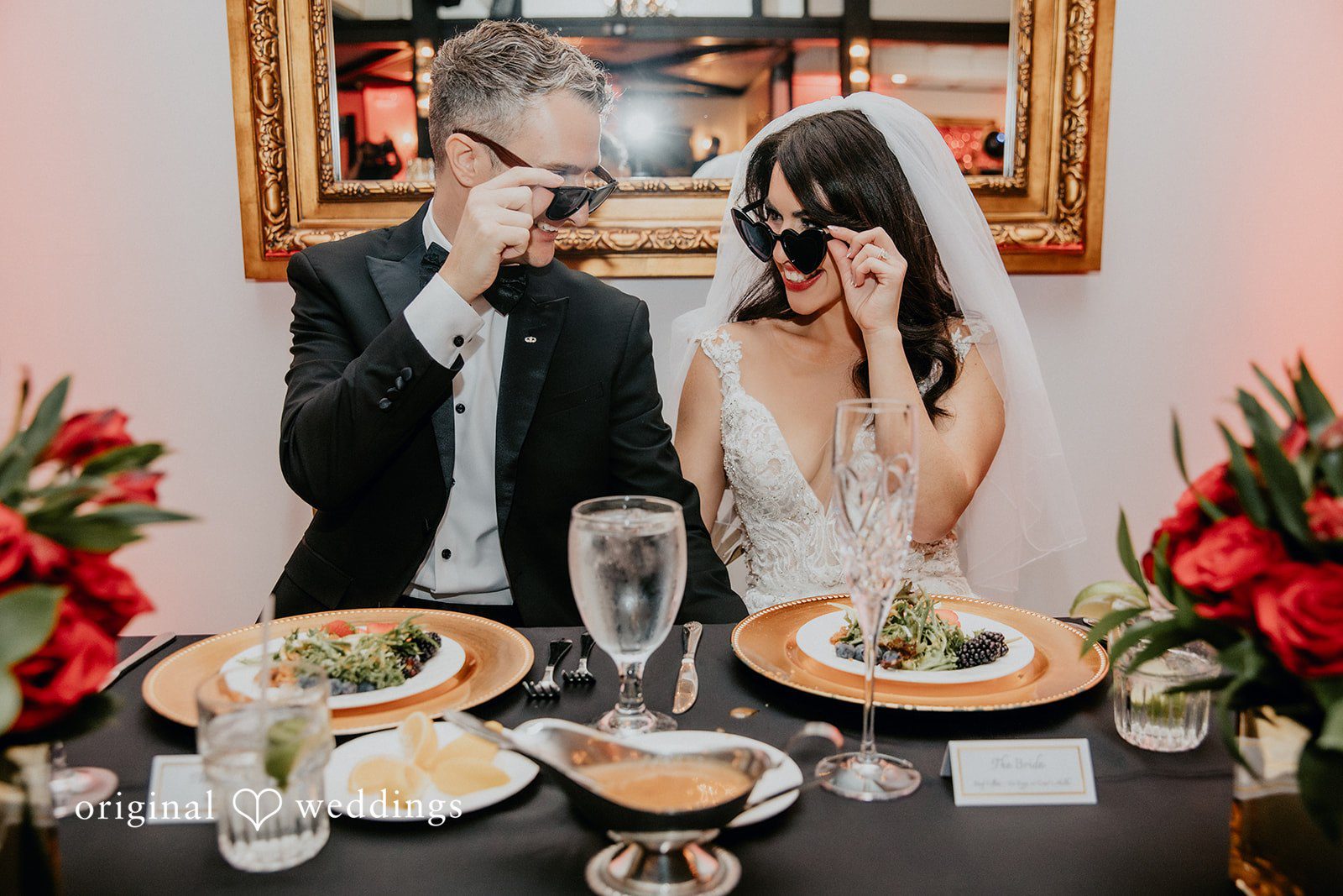 Elegant reception table portrait with the couple