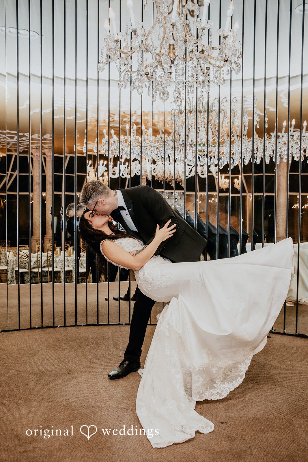 Romantic kiss between bride and groom