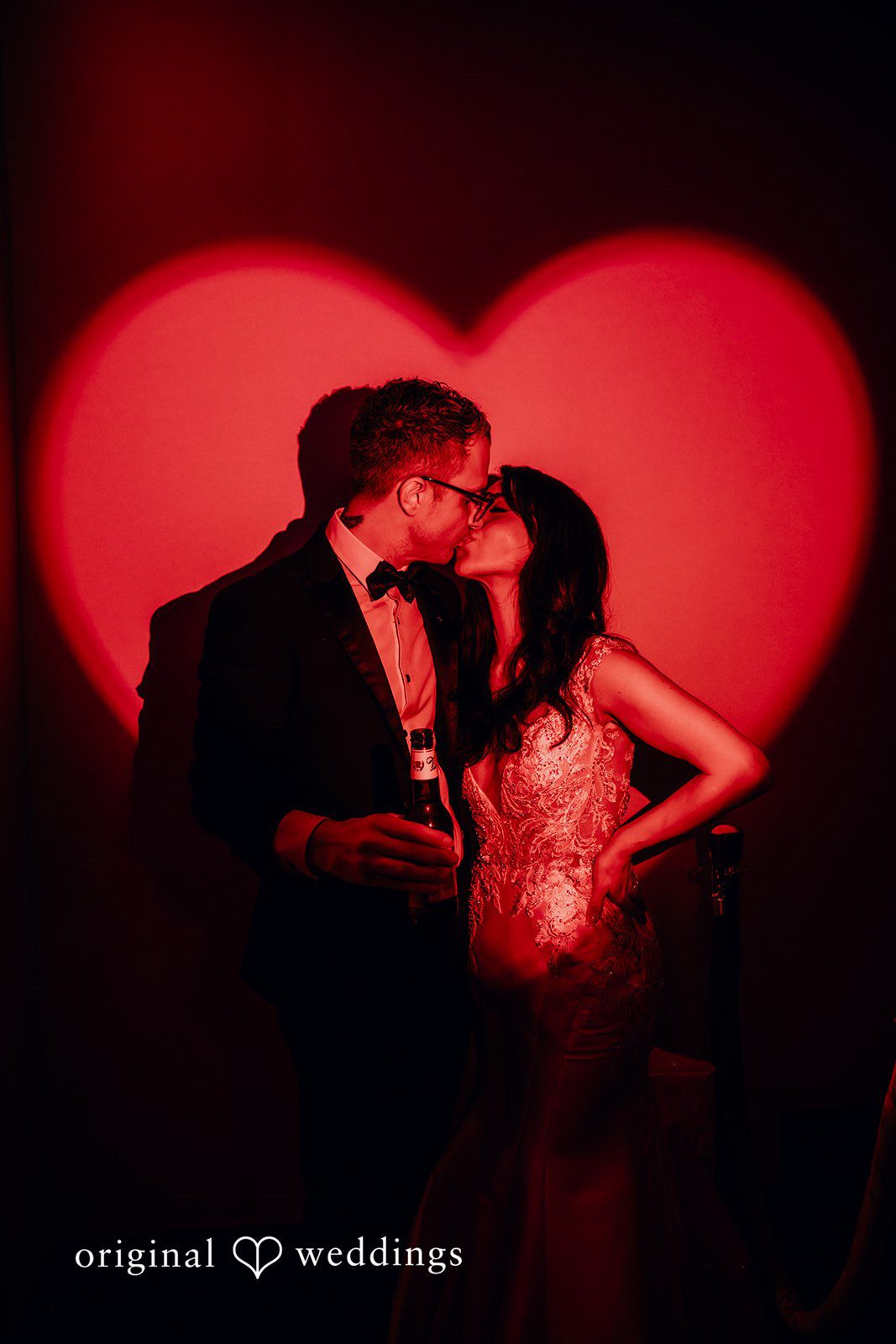 Romantic portrait under red lighting