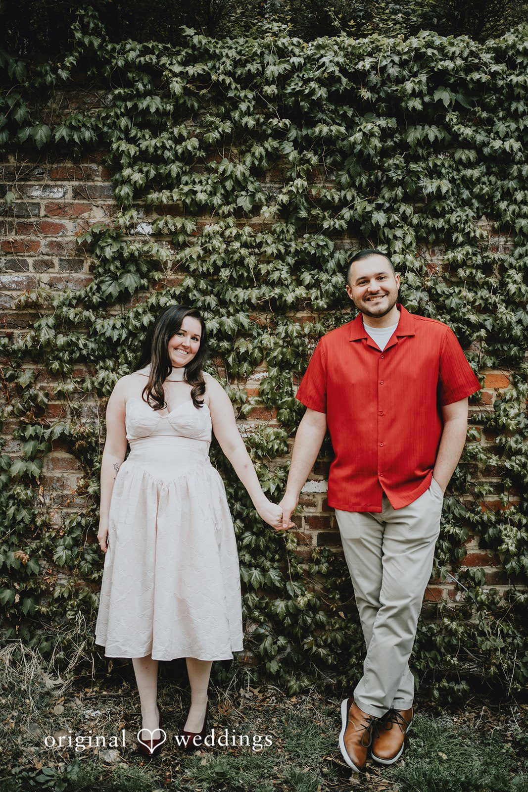 Lucy + Francesco A portrait of the couple framed by beautiful greenery