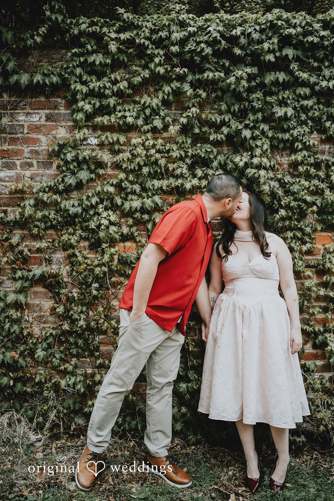 Lucy + Francesco A romantic portrait of the couple framed by beautiful greenery