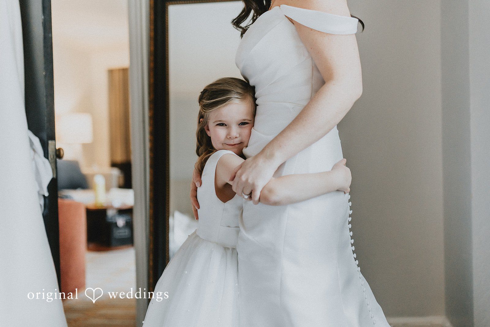 Brooklynn + Adam Soft emotional hug of child captured by Boston Wedding Photographers