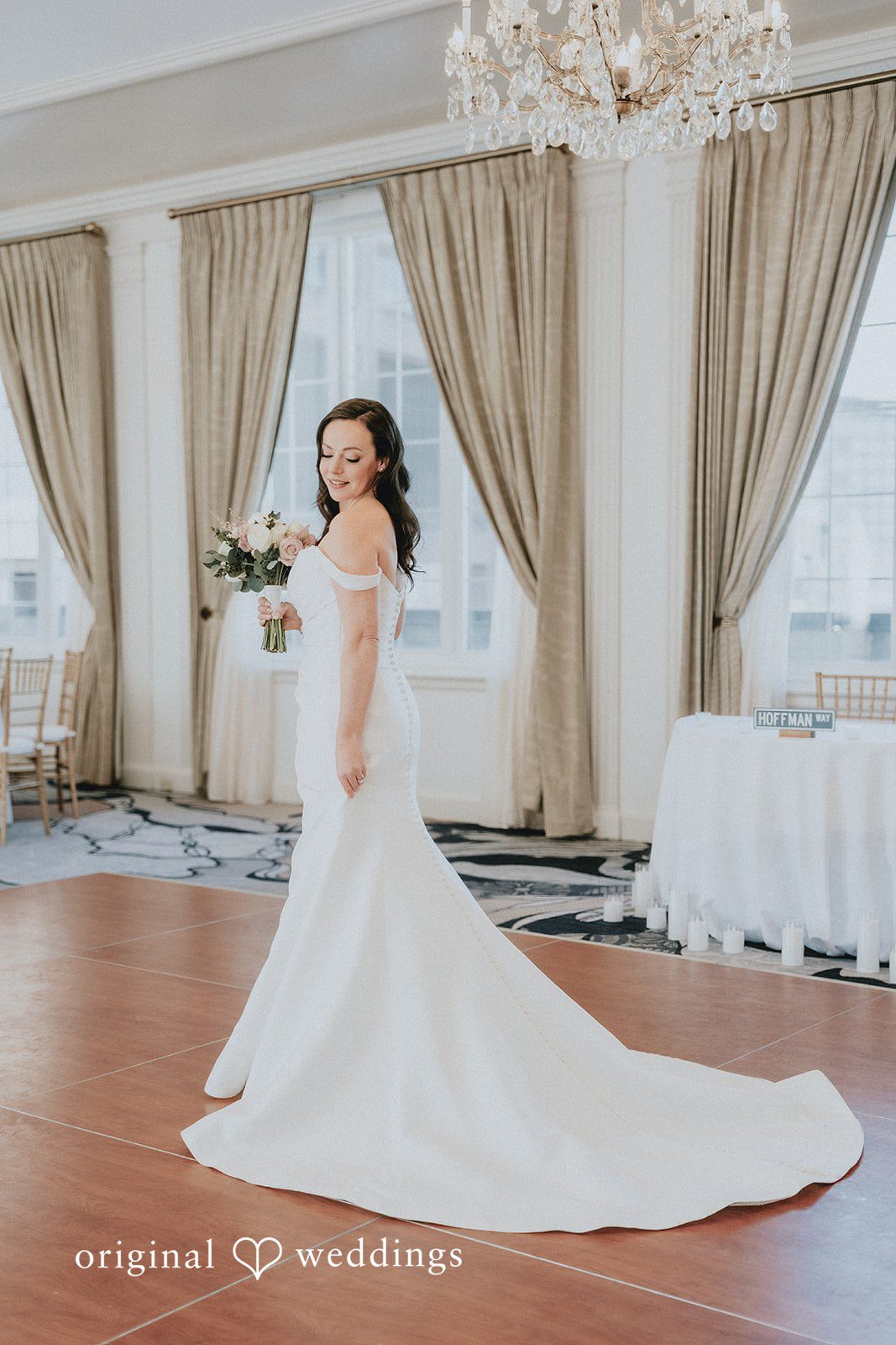 Brooklynn + Adam Candid bridal solo shot with bouquet in natural light at Omni Parker House