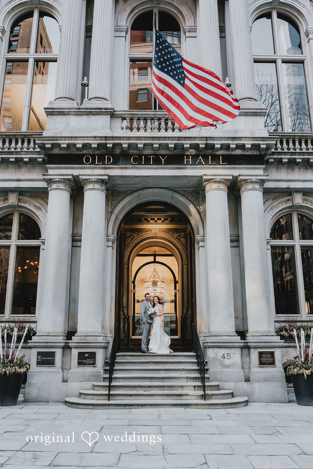 Brooklynn + Adam Elegant couple smile pose while standing together at Omni Parker House