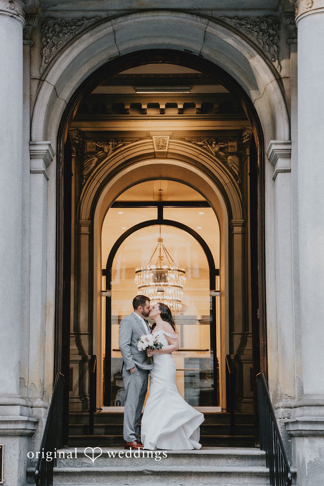 Brooklynn + Adam Elegant bride and groom sharing a sweet kiss