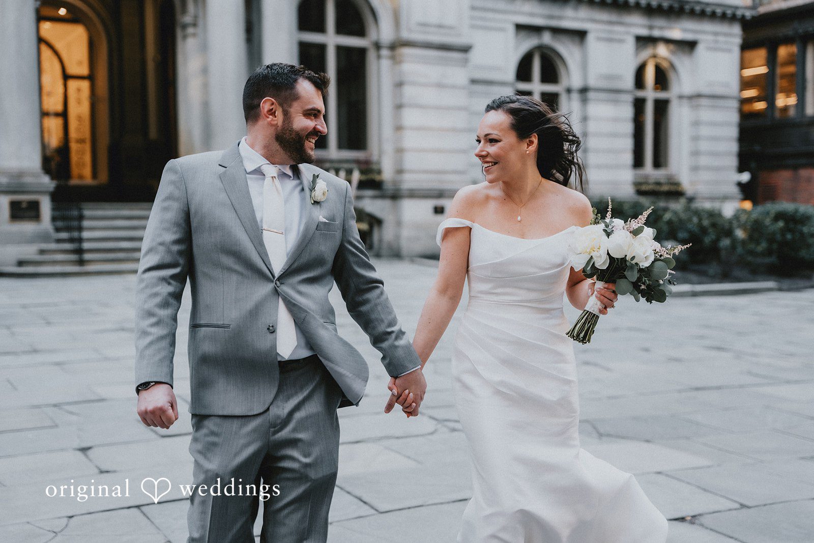 Brooklynn + Adam Boston Wedding Photographers capturing bride and groom walking outside at Omni Parker House by Original Weddings