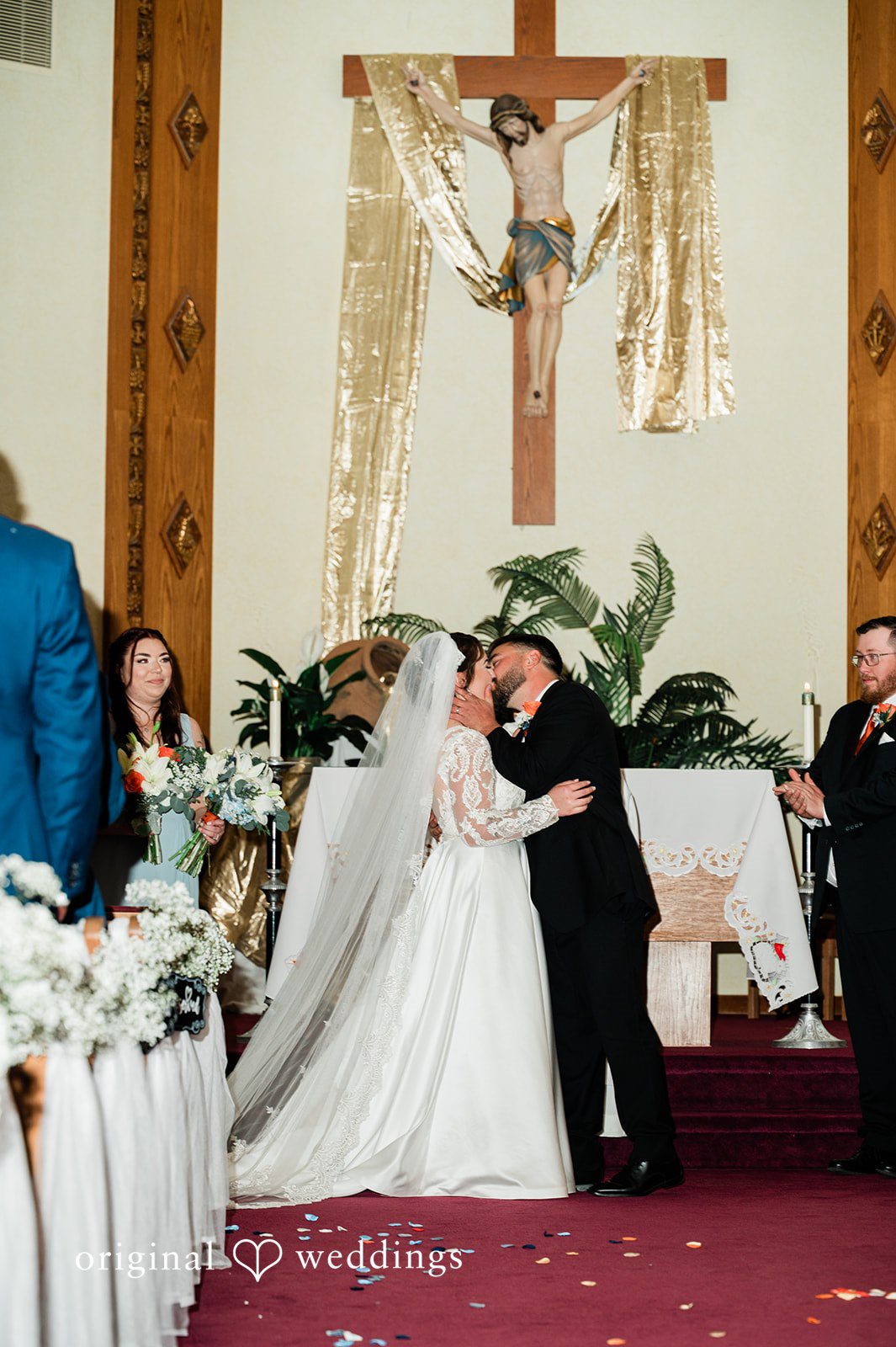 Christina + Quinton The couple seals their union with a kiss