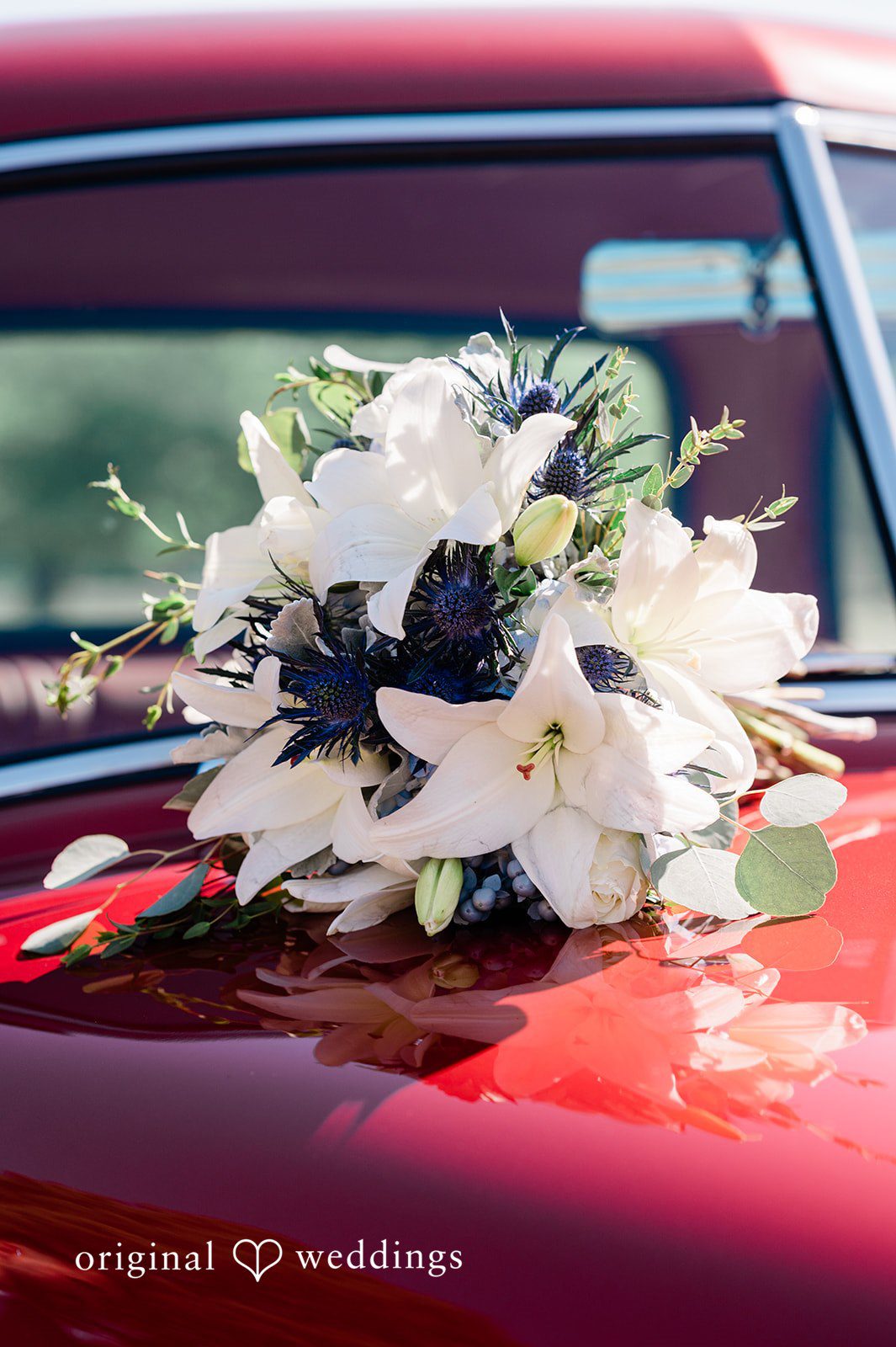 Christina + Quinton A stylish detail shot of the wedding bouquet