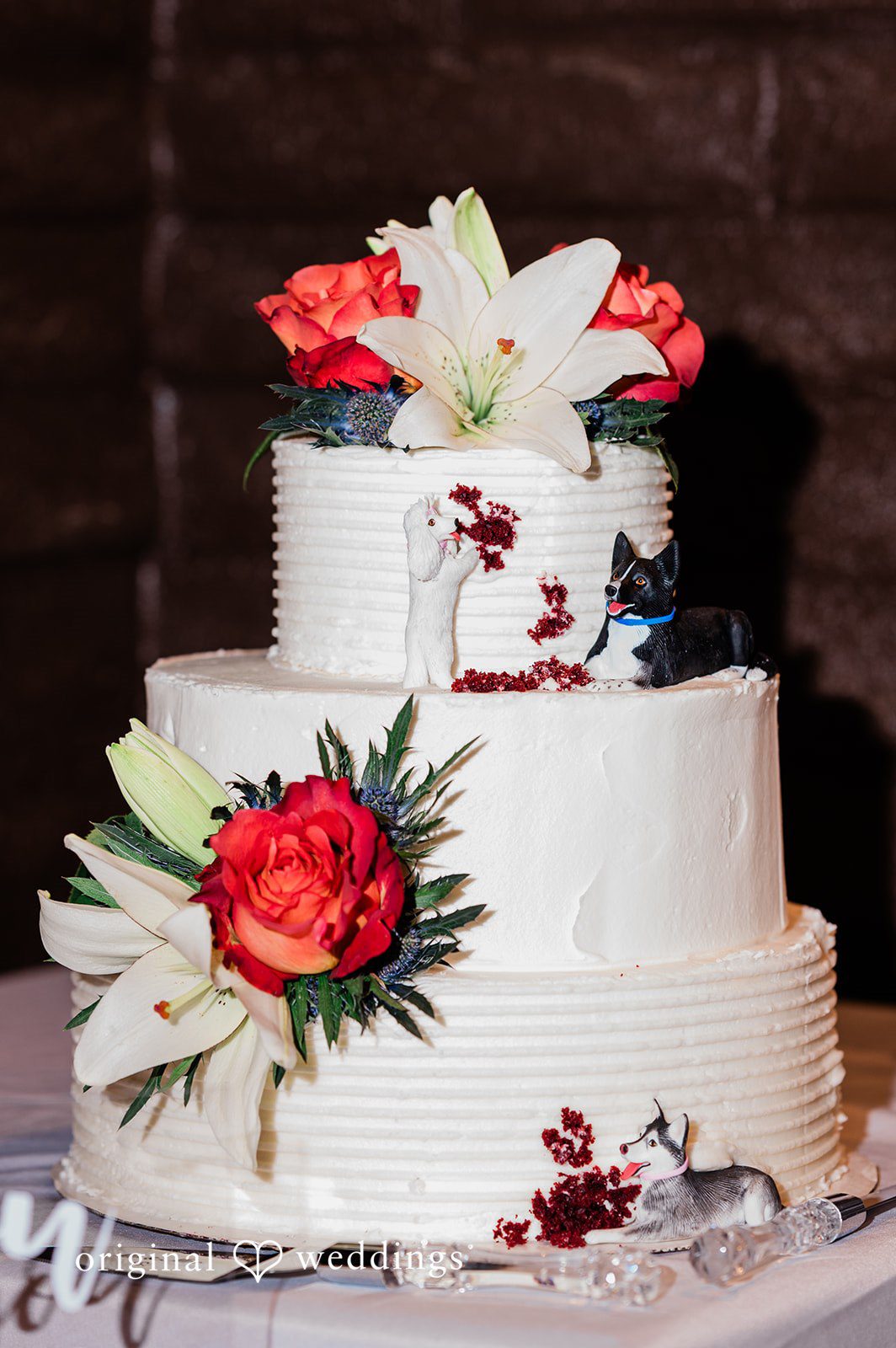 Christina + Quinton Wedding cake adorned with delicate florals