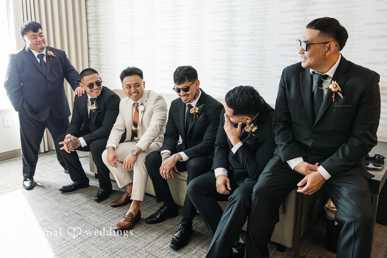 Charize Giann + Mark Shou Groomsmen posing together before ceremony with joyful expressions