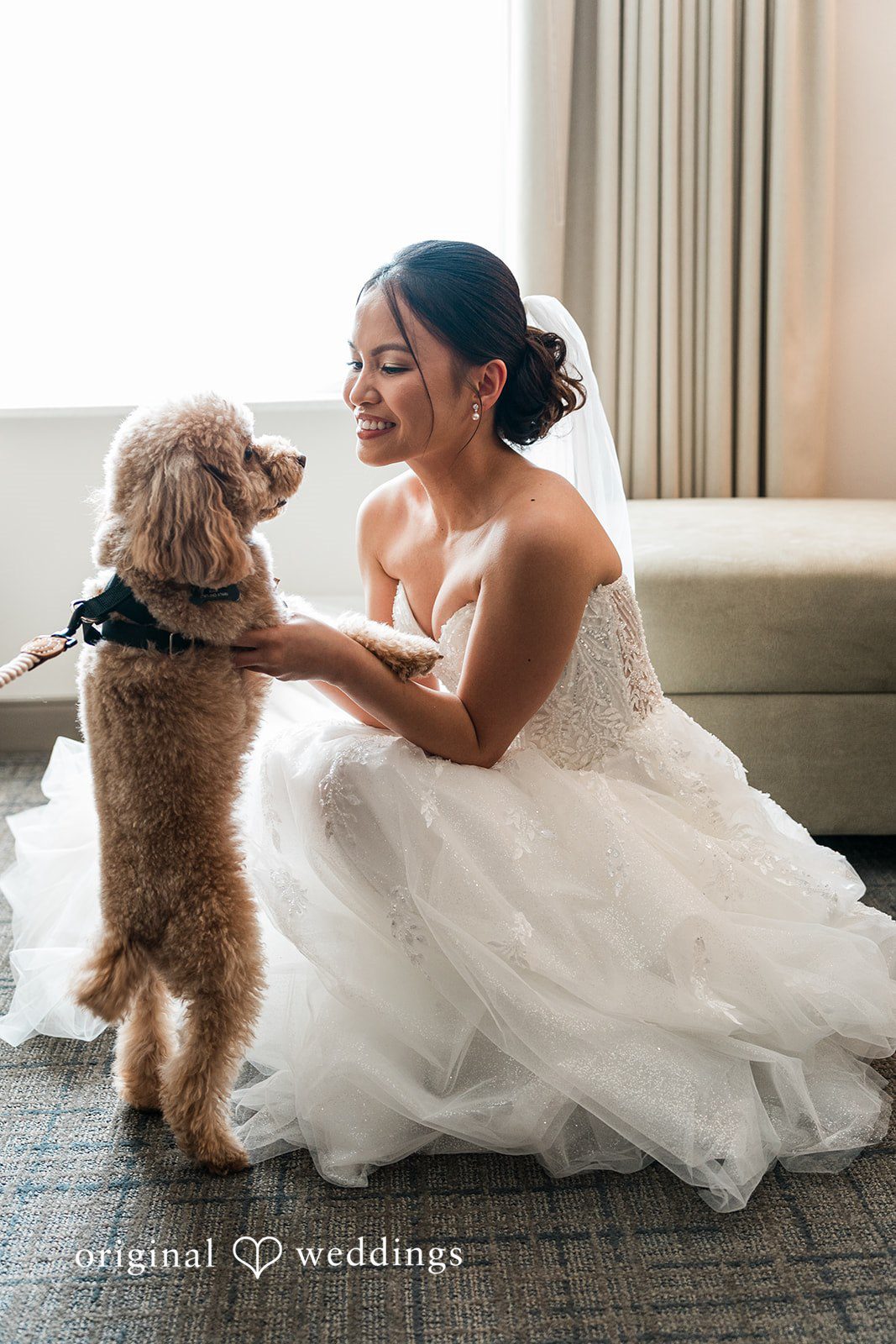 Charize Giann + Mark Shou Bride sharing a sweet and joyful moment with her dog while getting ready for her wedding day