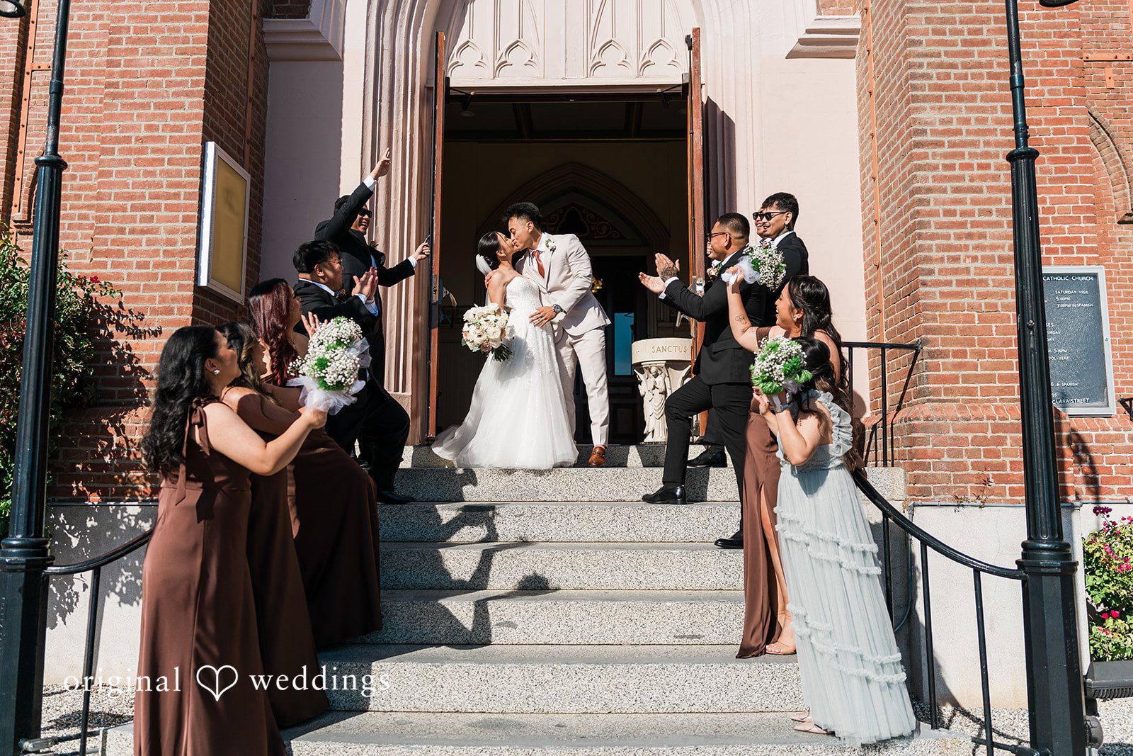 Charize Giann + Mark Shou Romantic moment of bride and groom kissing after wedding ceremony