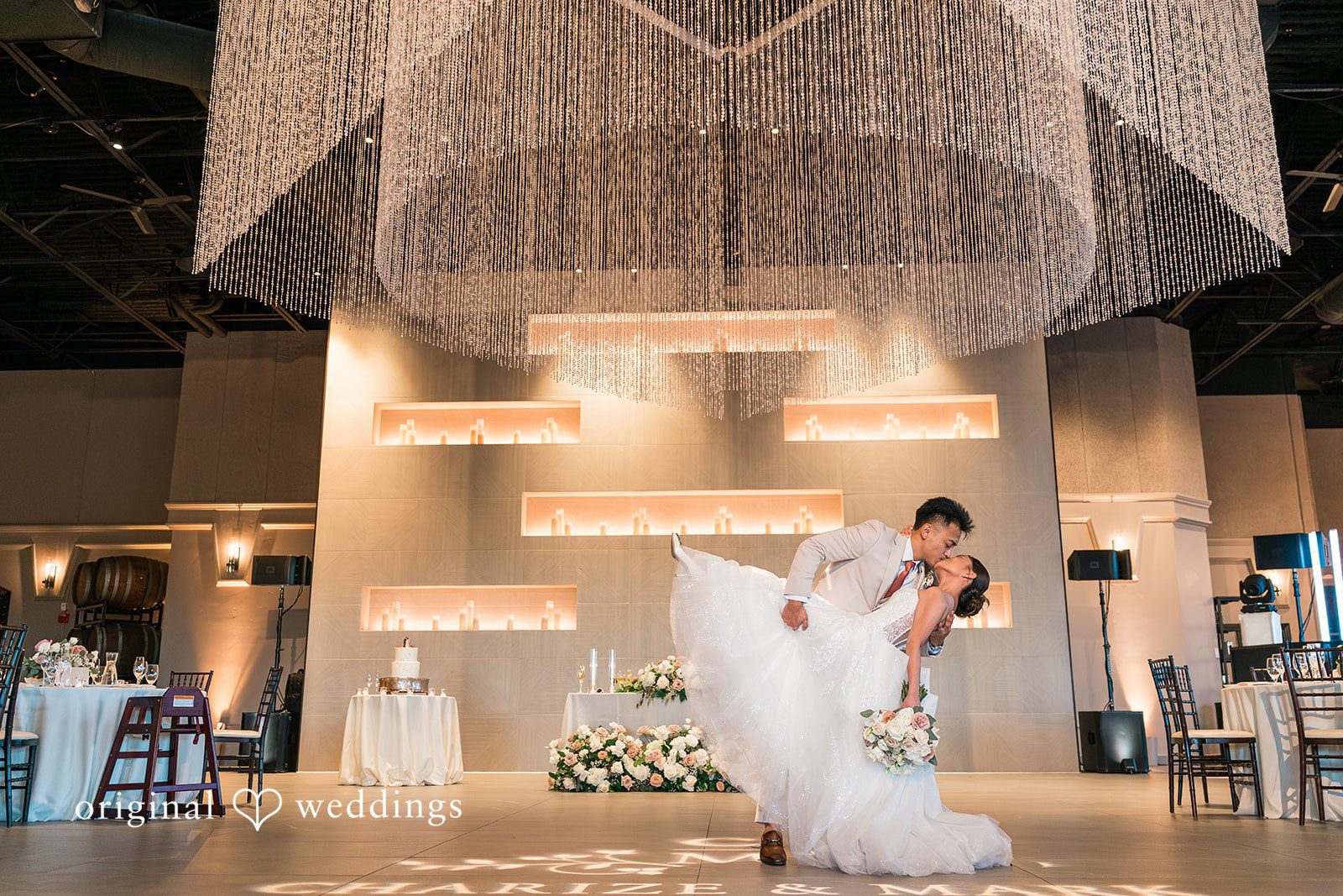 Charize Giann + Mark Shou Bride and groom sharing a romantic kiss on the dance floor