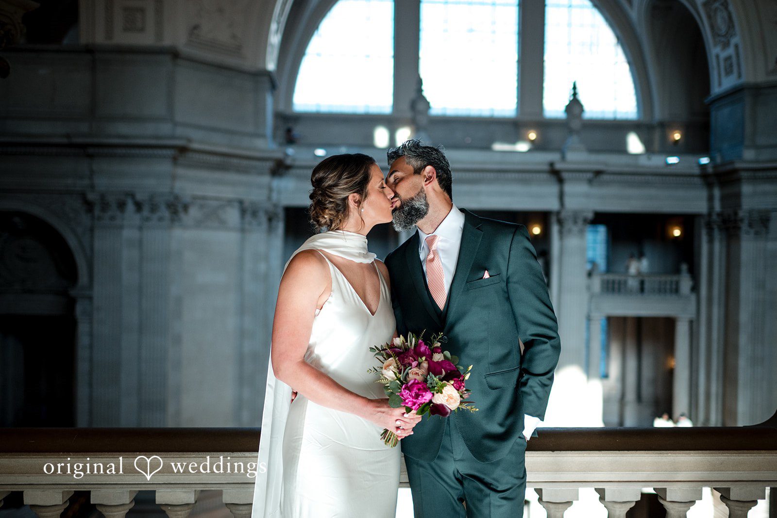 The couple shares a romantic kiss