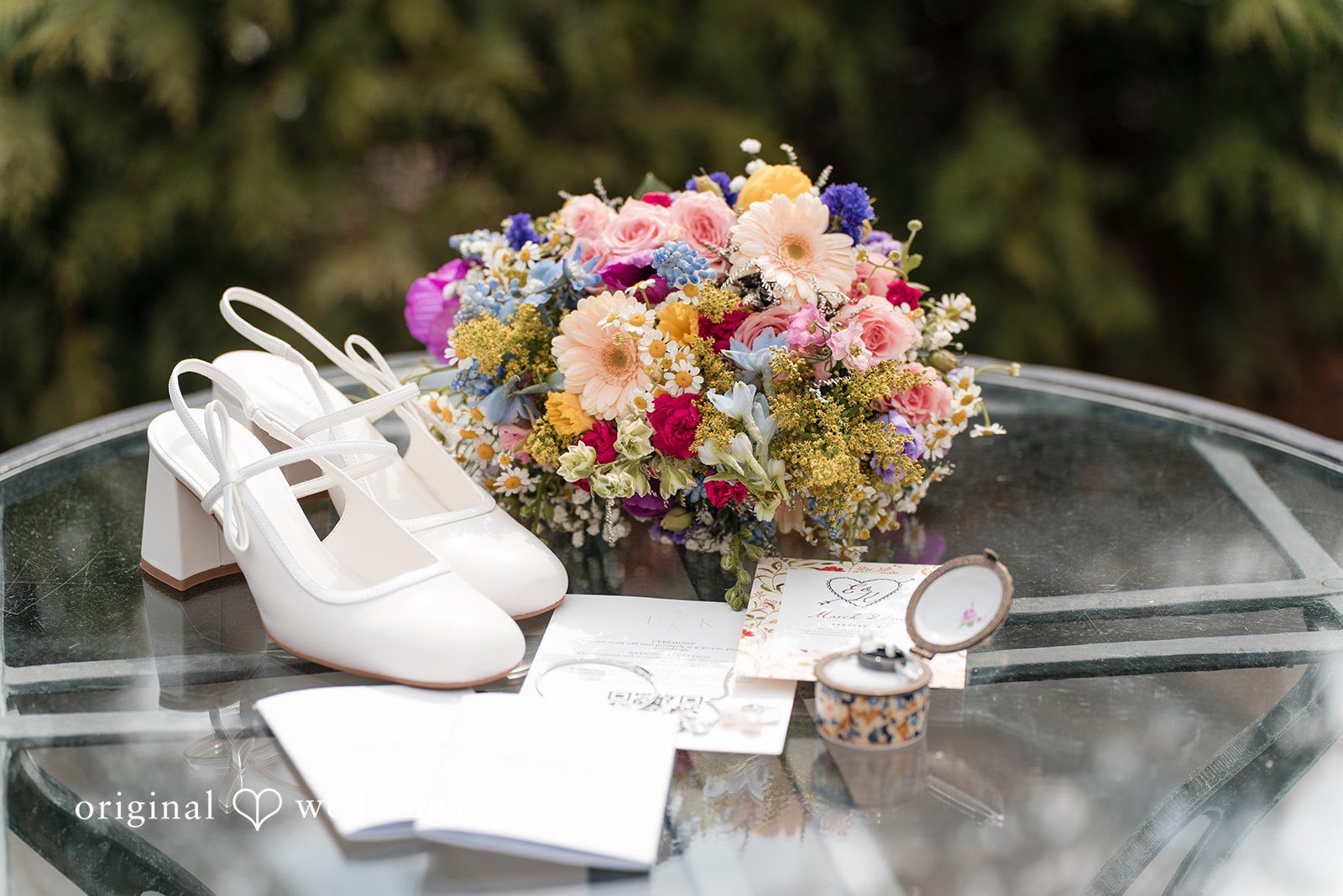 Elegant bridal shoes and floral bouquet