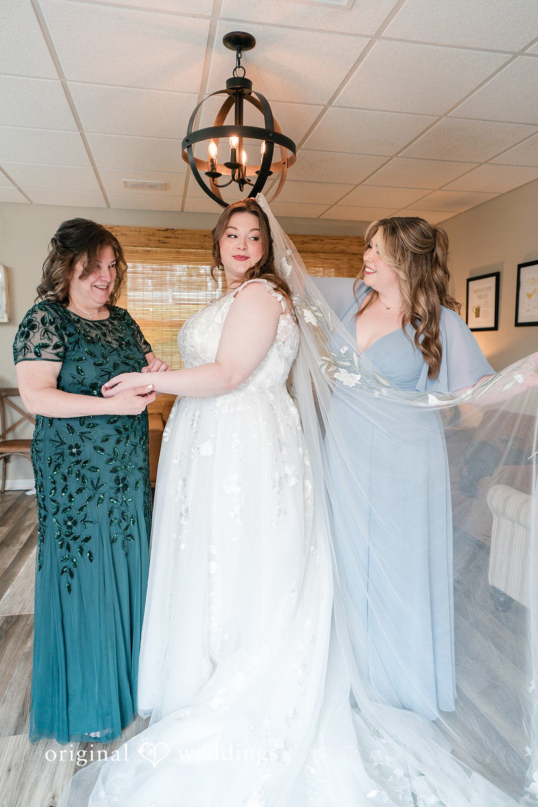 Beautiful bride with bridesmaid at Perona Farms