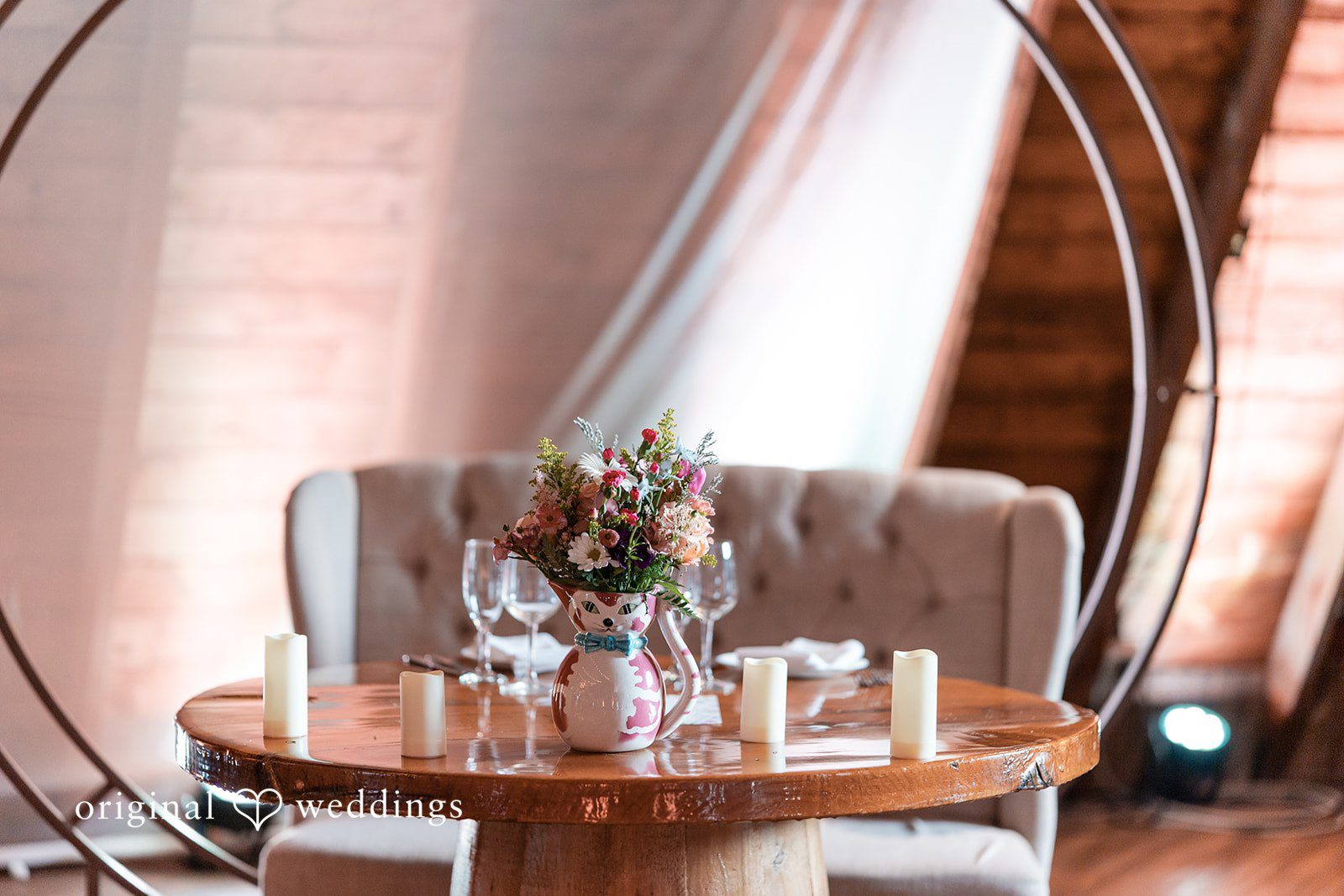 Elegant reception table centerpiece at Perona Farms