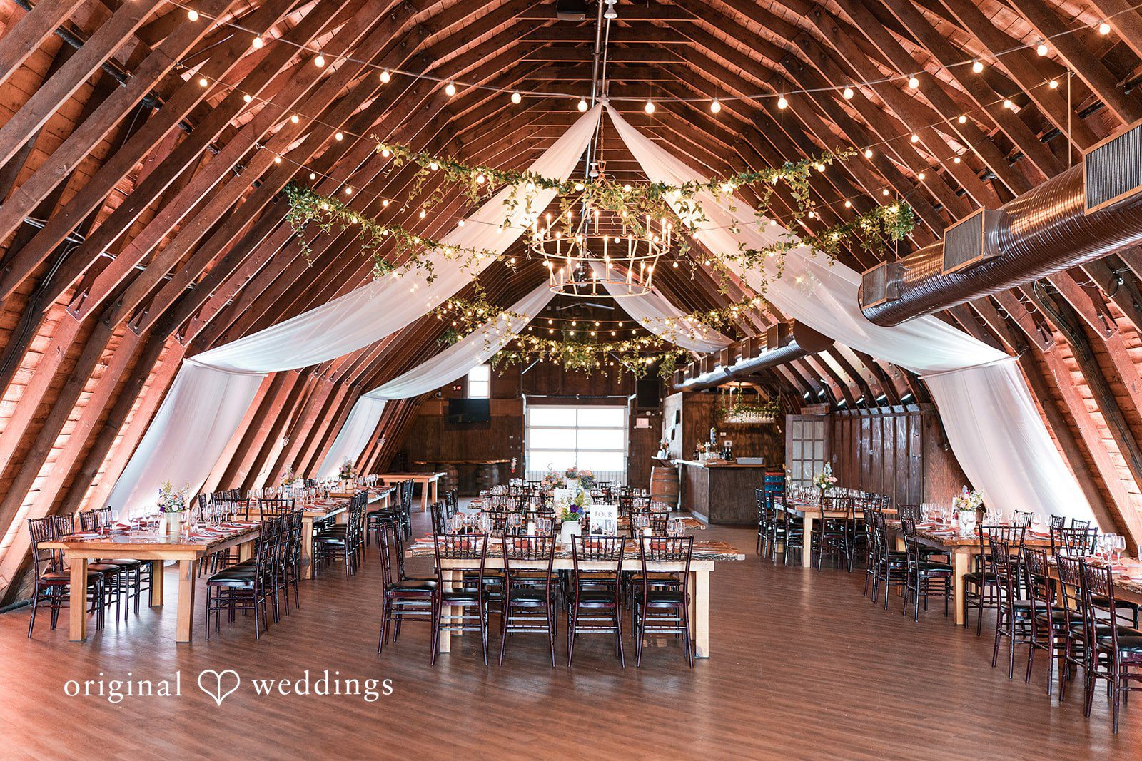 Elegant indoor wedding reception at Perona Farms