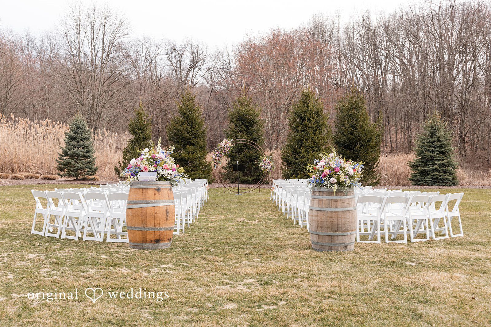 Outdoor wedding ceremony setup at Perona Farms