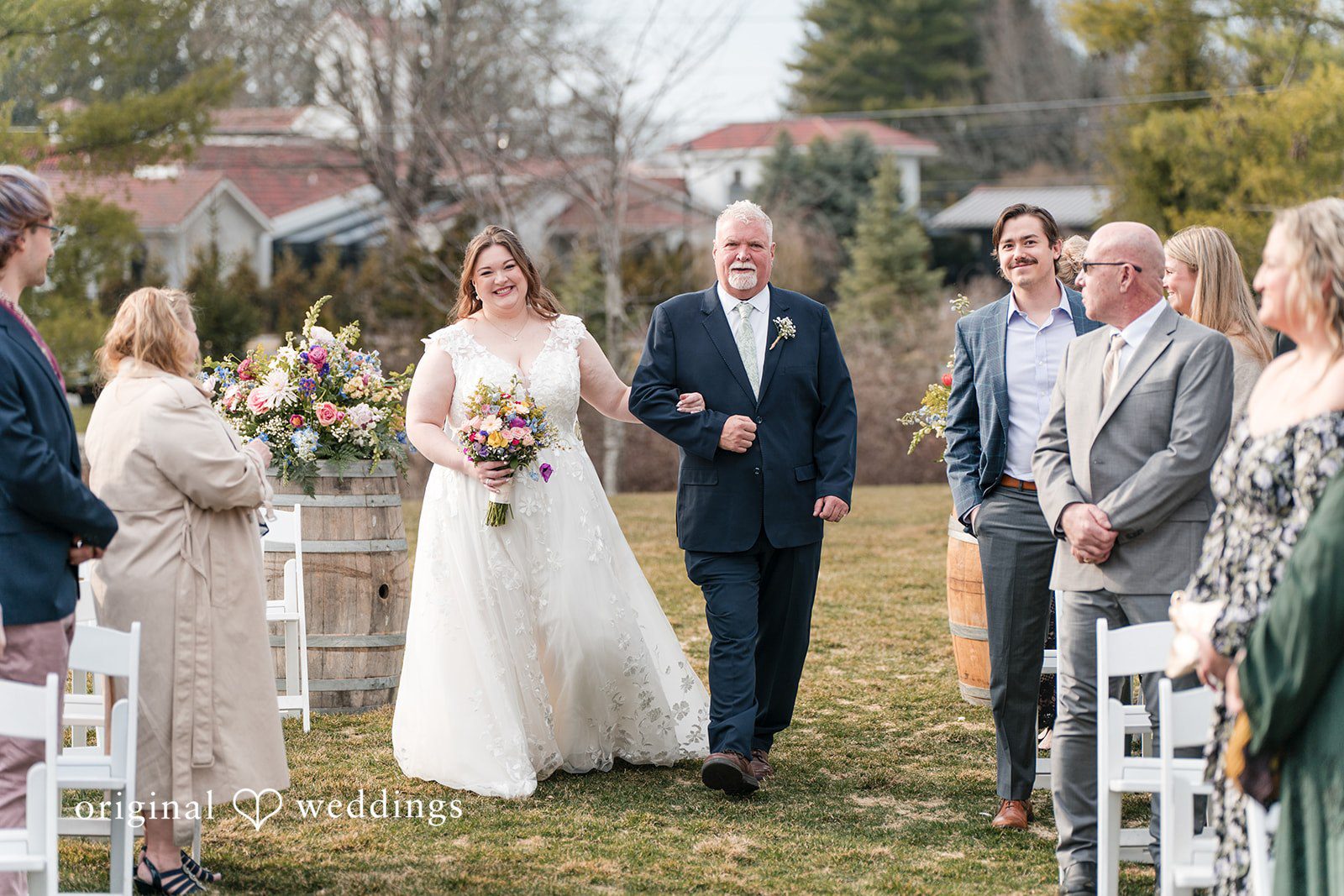 Bride walking down the aisle at Perona Farms, captured by New York Wedding Photographer from Original Weddings