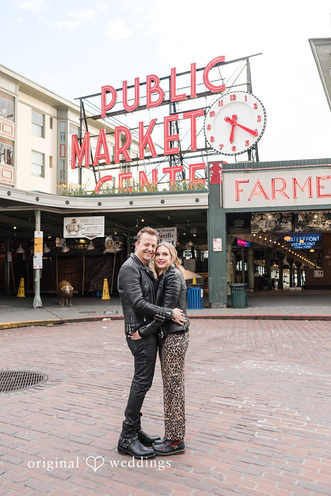 Candid hug moment of couple at Pike Place Market