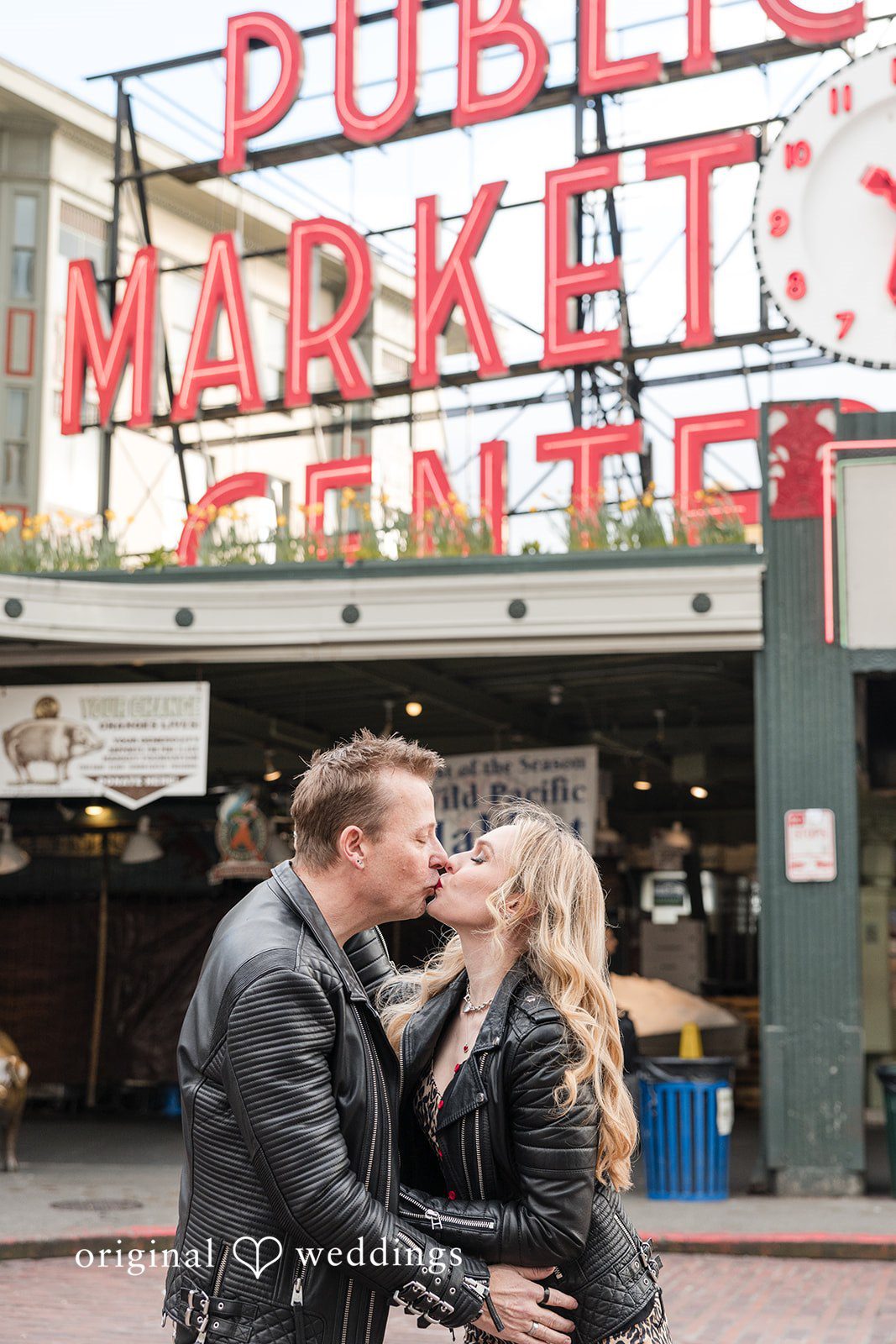 Lovely couple sharing kiss during photo session