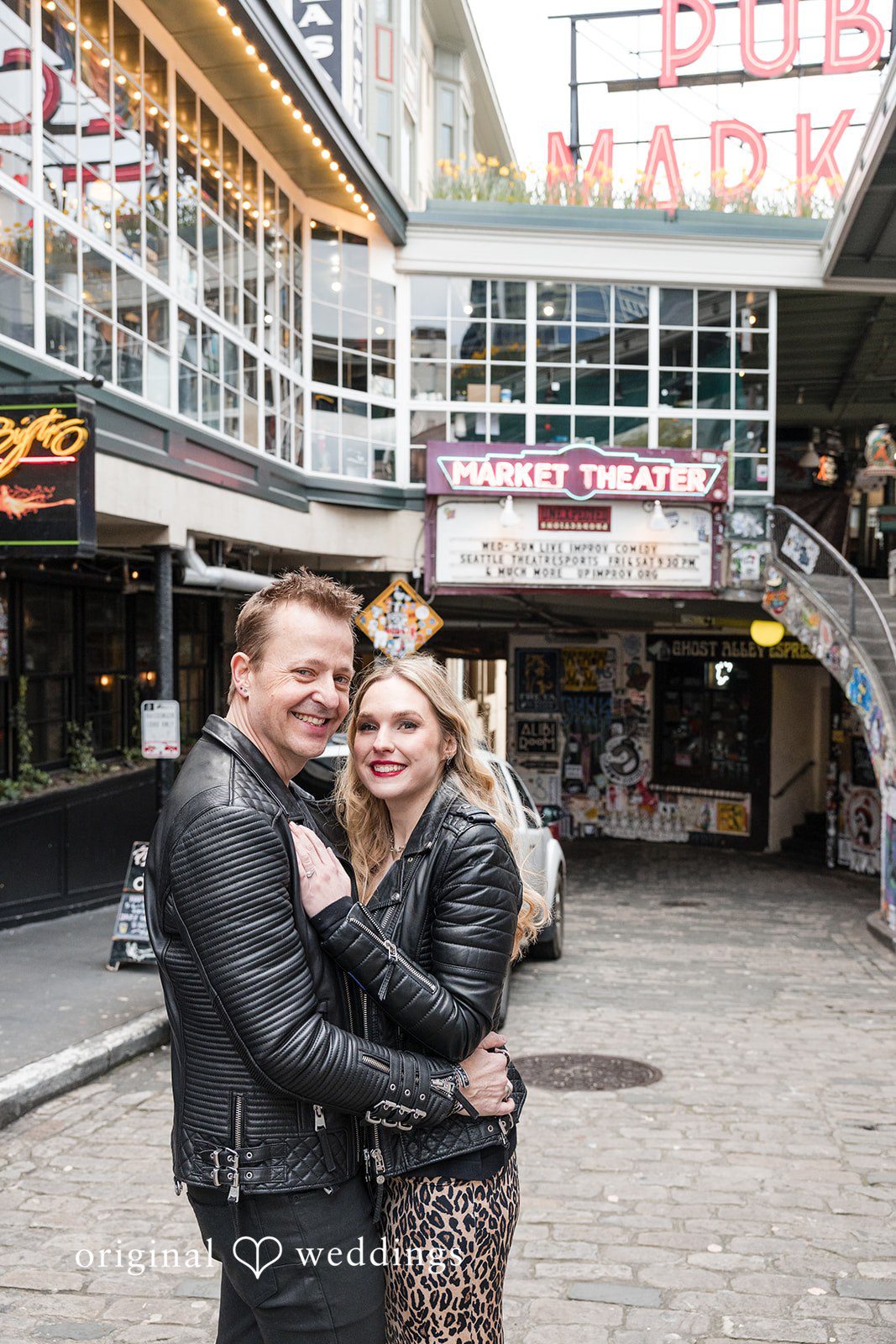 Engagement photography services at Pike Place Market by original weddings capturing the beautiful memories of couple
