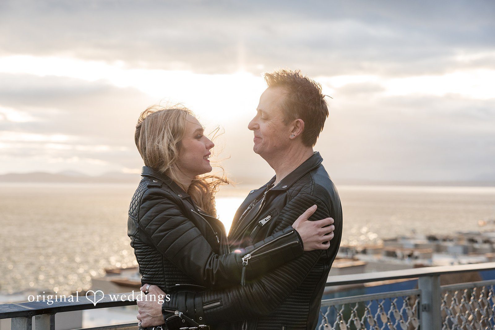 Beautiful couple looking at each other with love at Pike Place Market