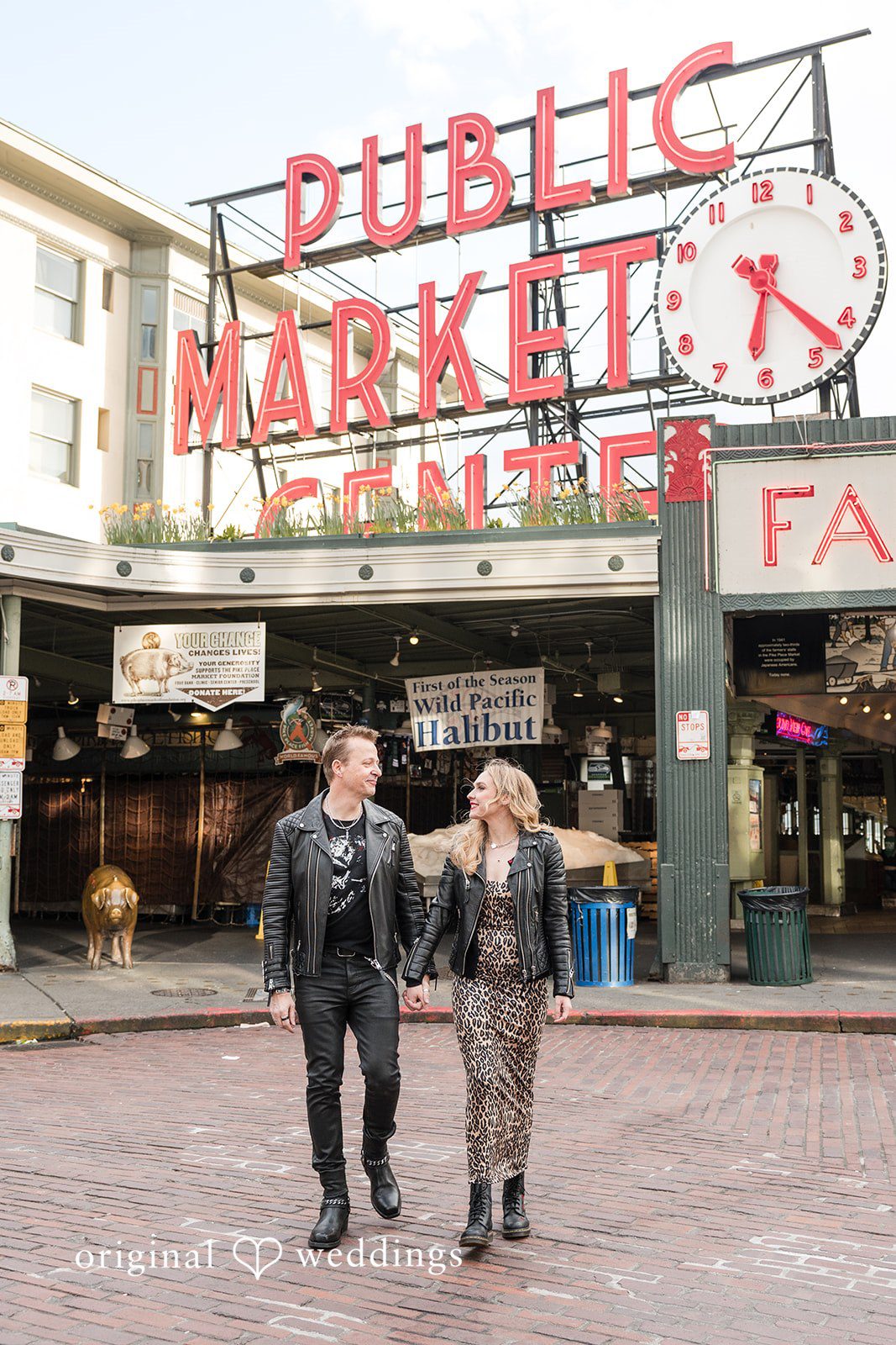 Lovely couple walking and looking at each other at Pike Place Market