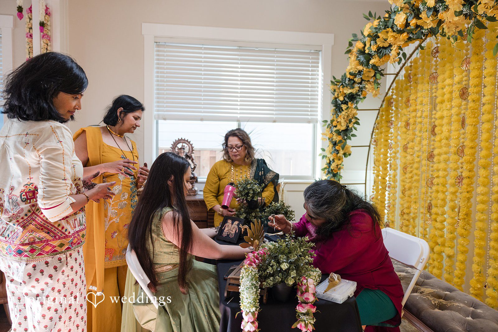 Taylor + Yash Traditional engagement celebration with family and henna artist