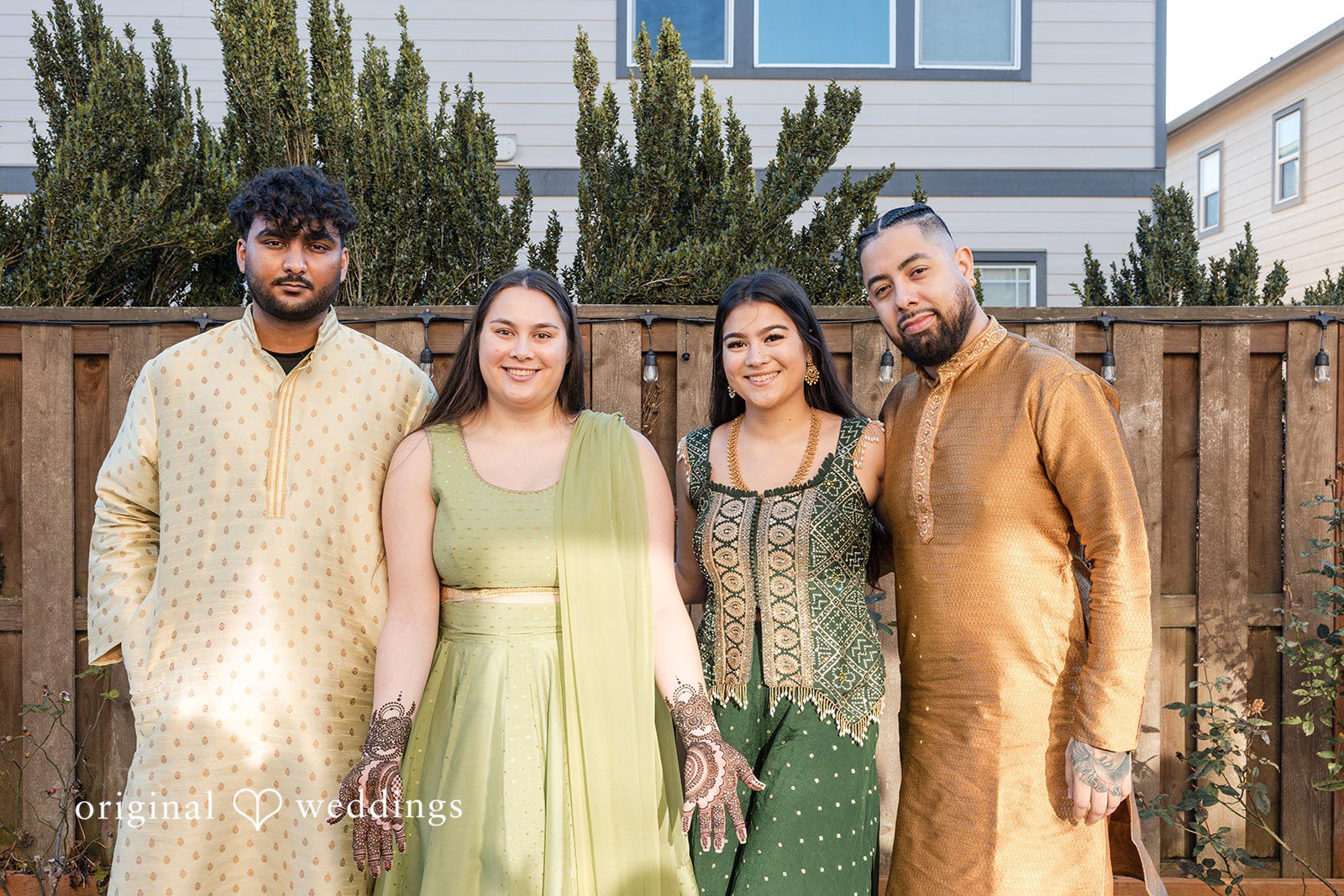 Taylor + Yash Family members posing during engagement celebration