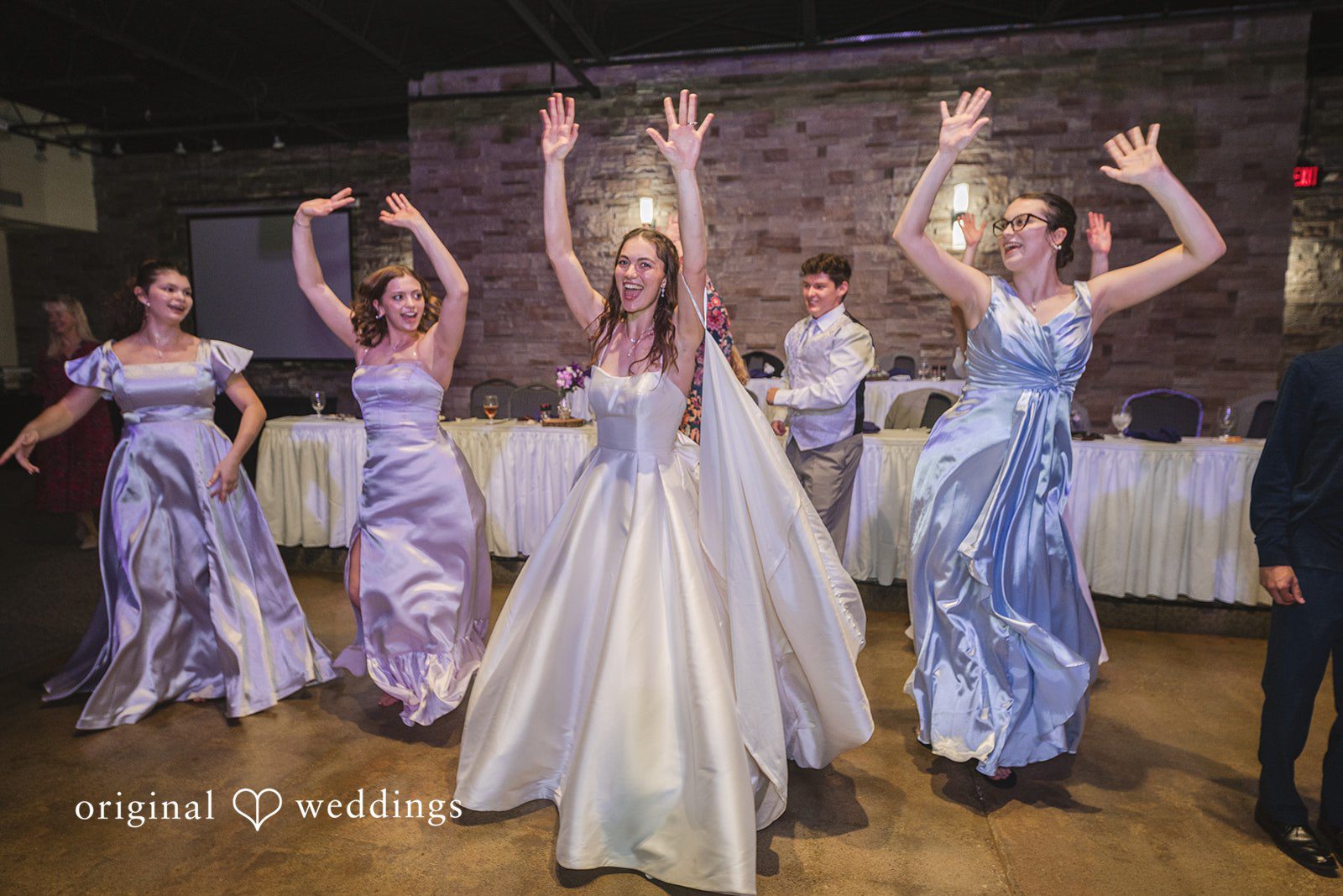 Samantha + Ryan Bride dancing with bridesmaids at the reception celebration