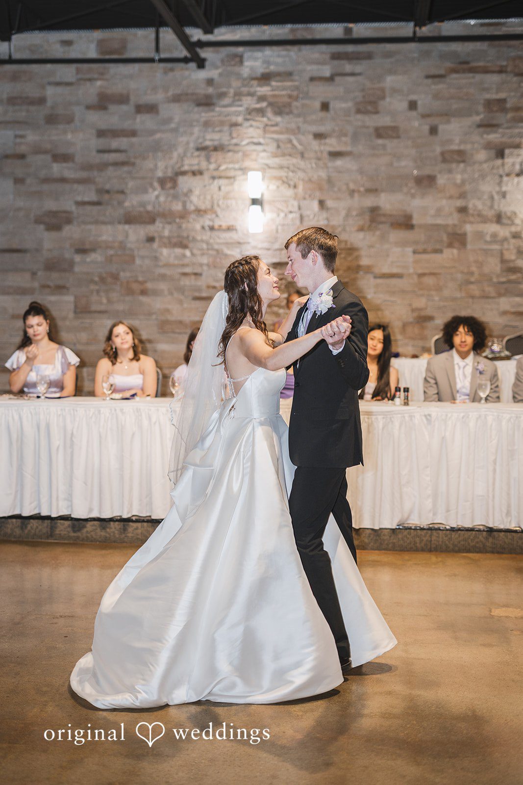 Samantha + Ryan Couple sharing their first dance during the reception