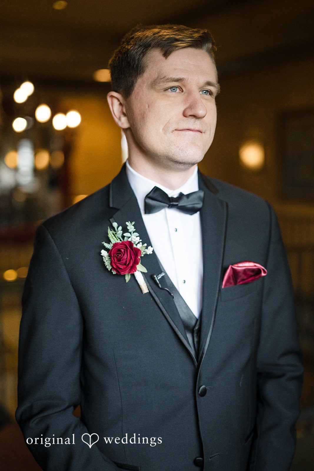 Groom portrait in classic black tuxedo styling