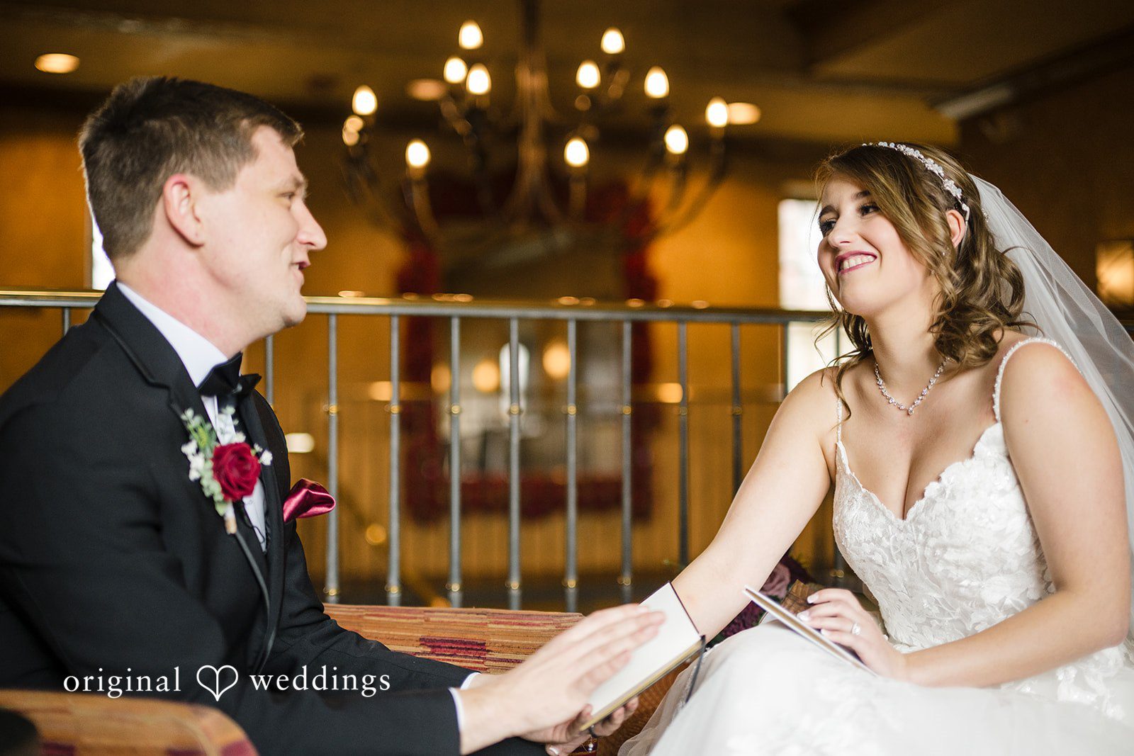 Bride and groom smiling during an intimate moment together