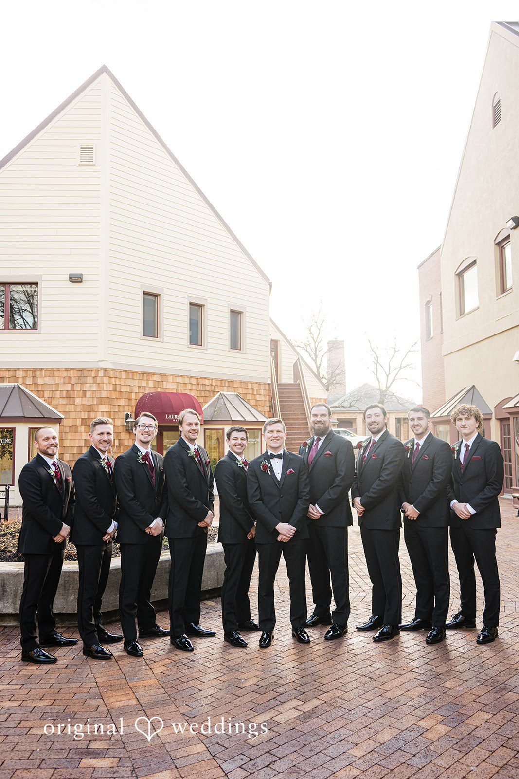 Groomsmen group portrait outside the wedding venue