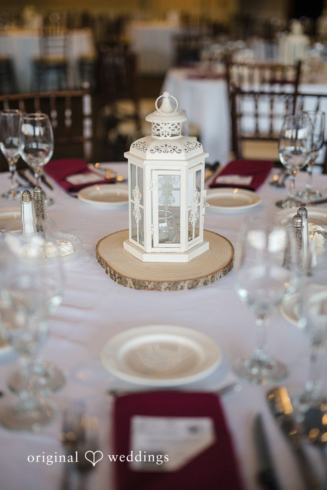 Reception centerpiece detail with candle lantern decor