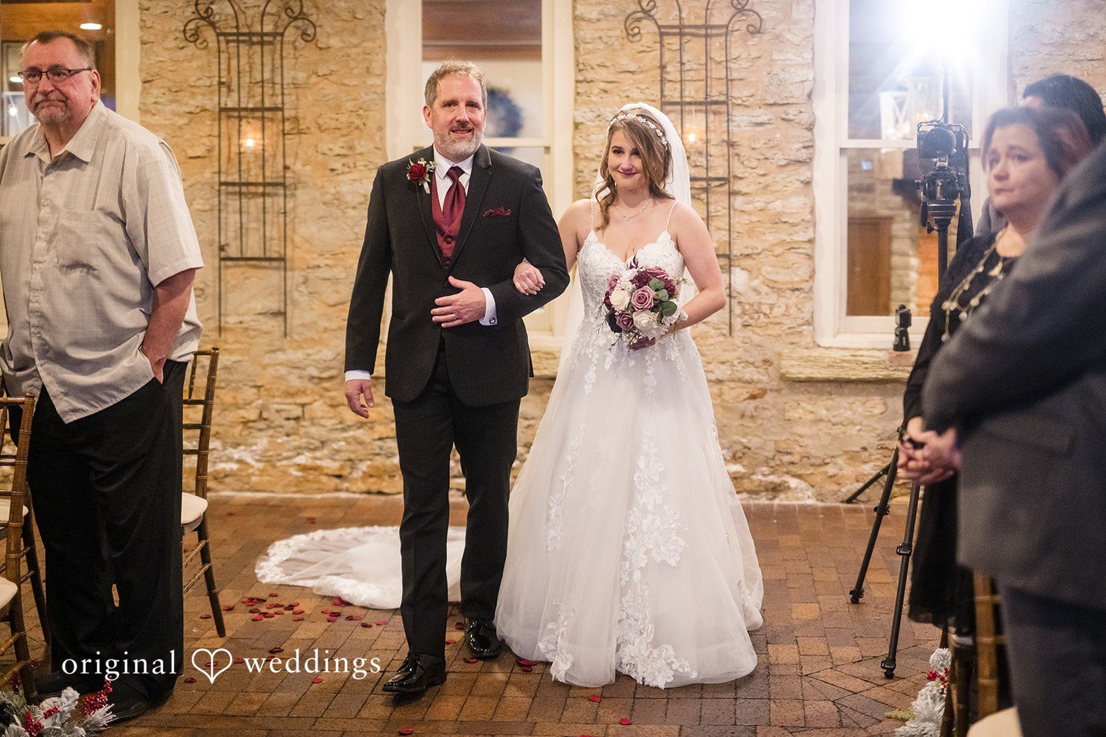 Bride walking down the aisle during the ceremony