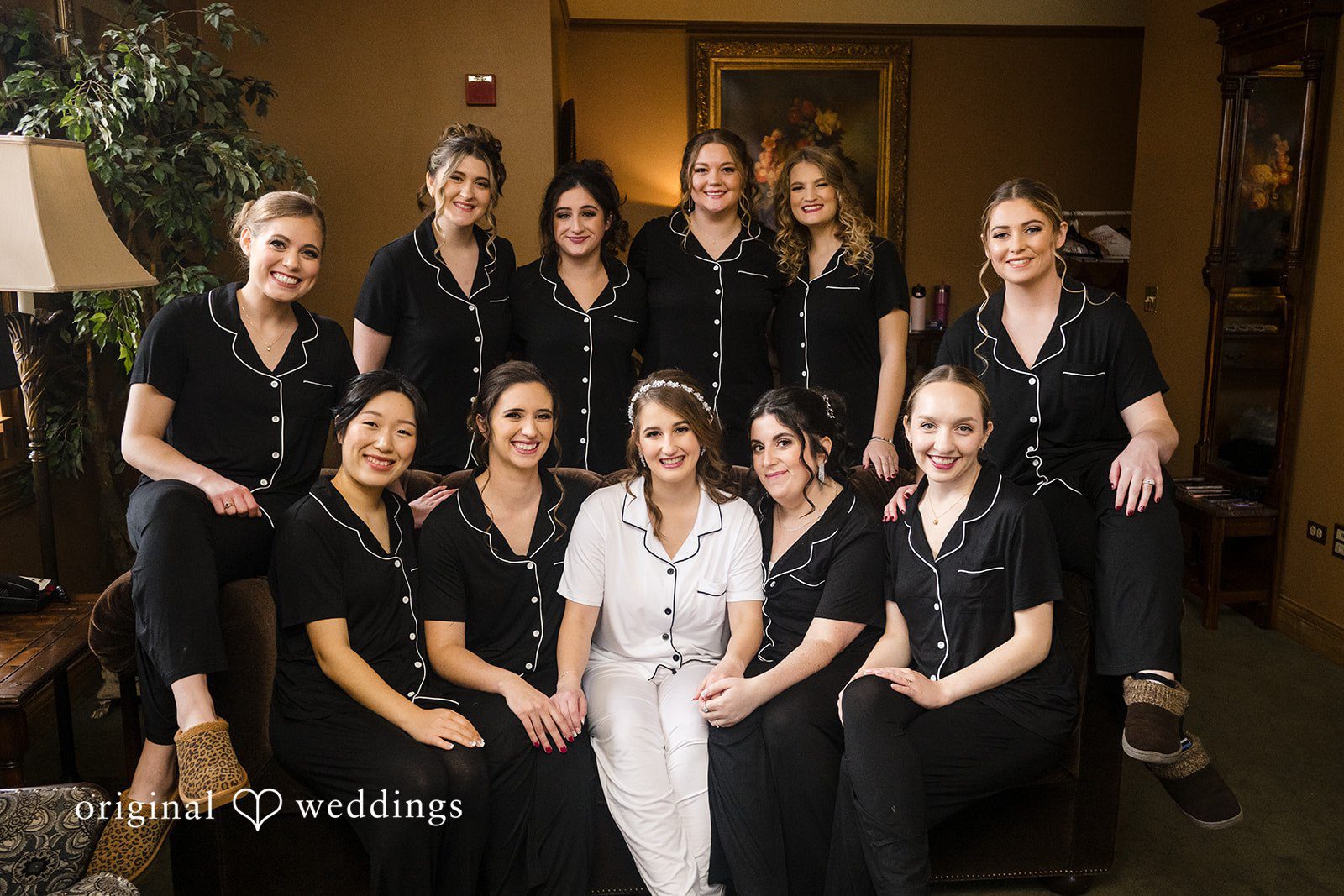 Bride with bridesmaids getting ready before the ceremony