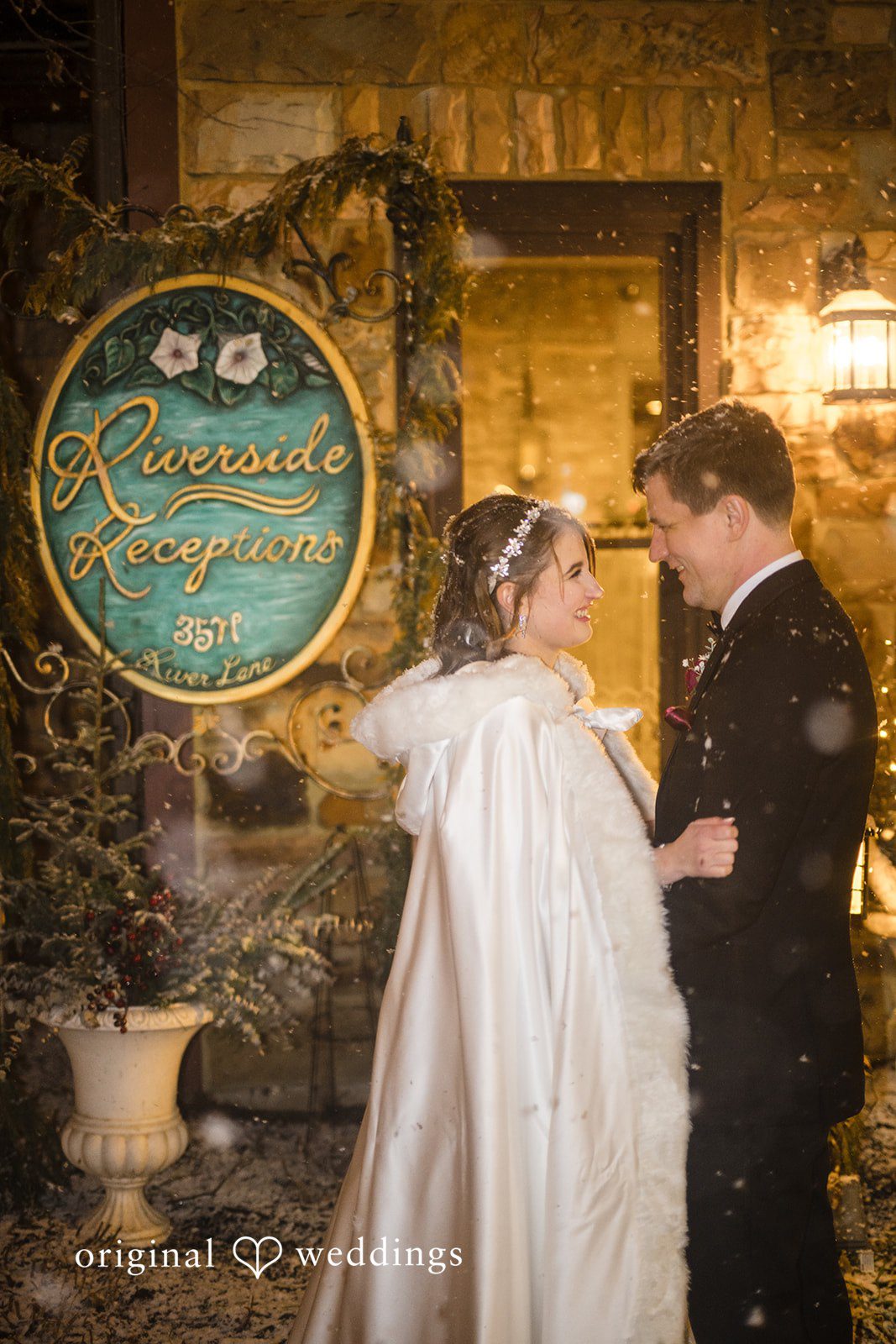 Romantic nighttime portrait outside Riverside Receptions