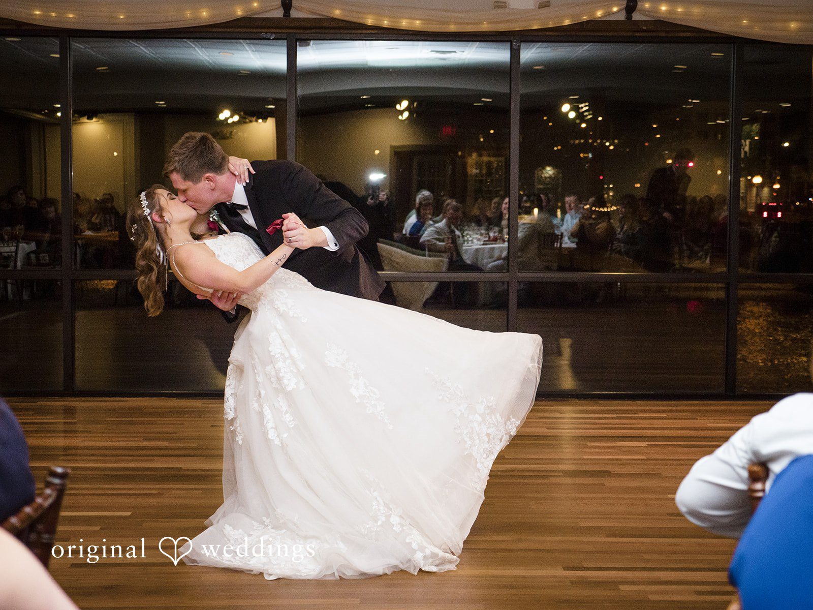 Romantic first dance dip during the wedding reception