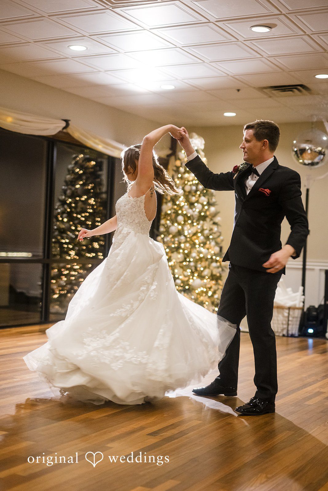 Bride twirling during the couple’s first dance