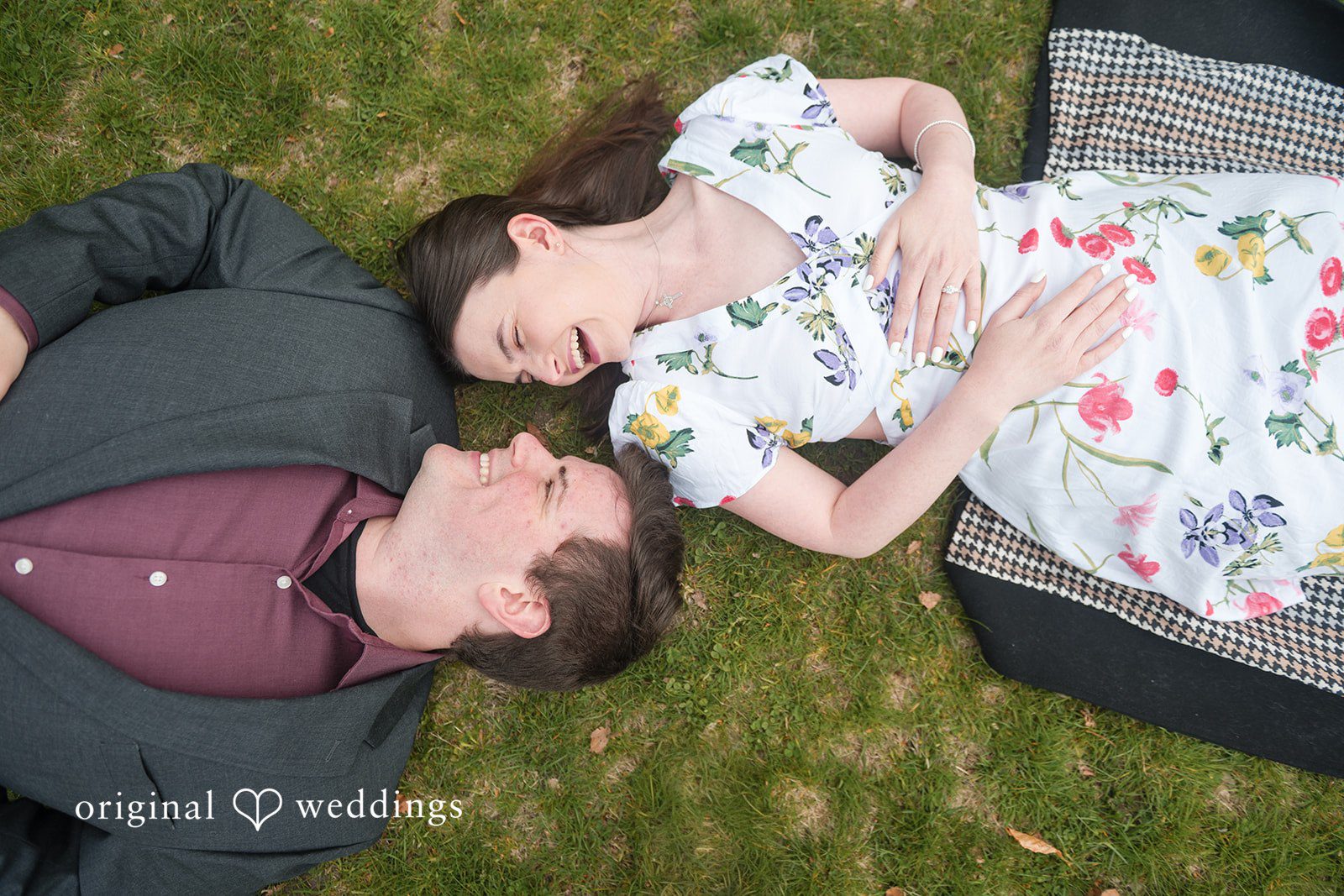 Romantic couple lying together at Roger Williams Park