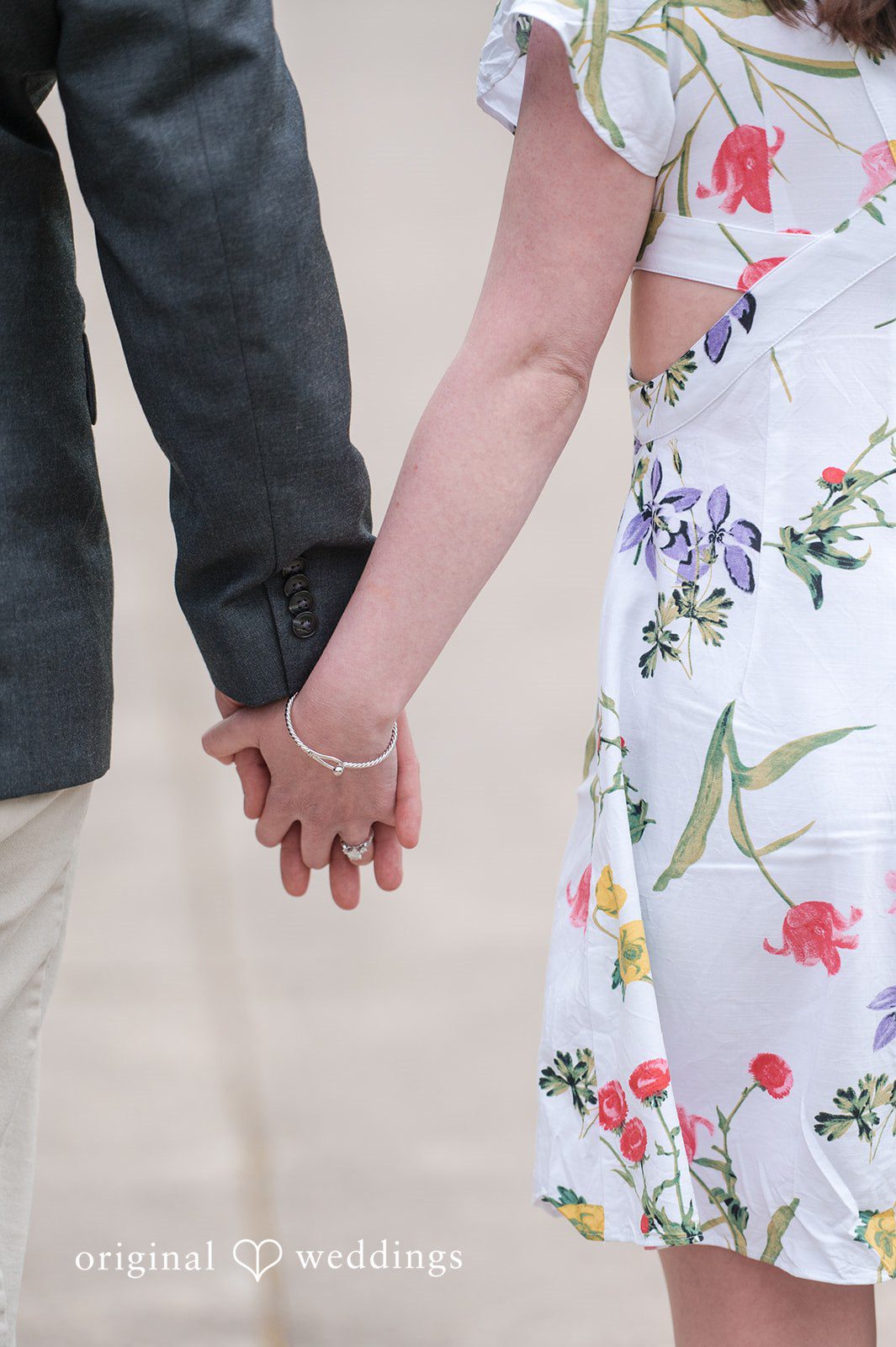 Romantic couple holding hands at Roger Williams Park
