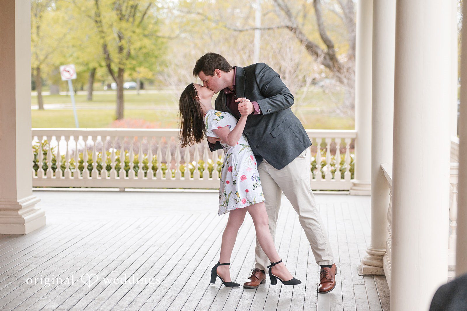 Romantic kiss between couple at Roger Williams Park