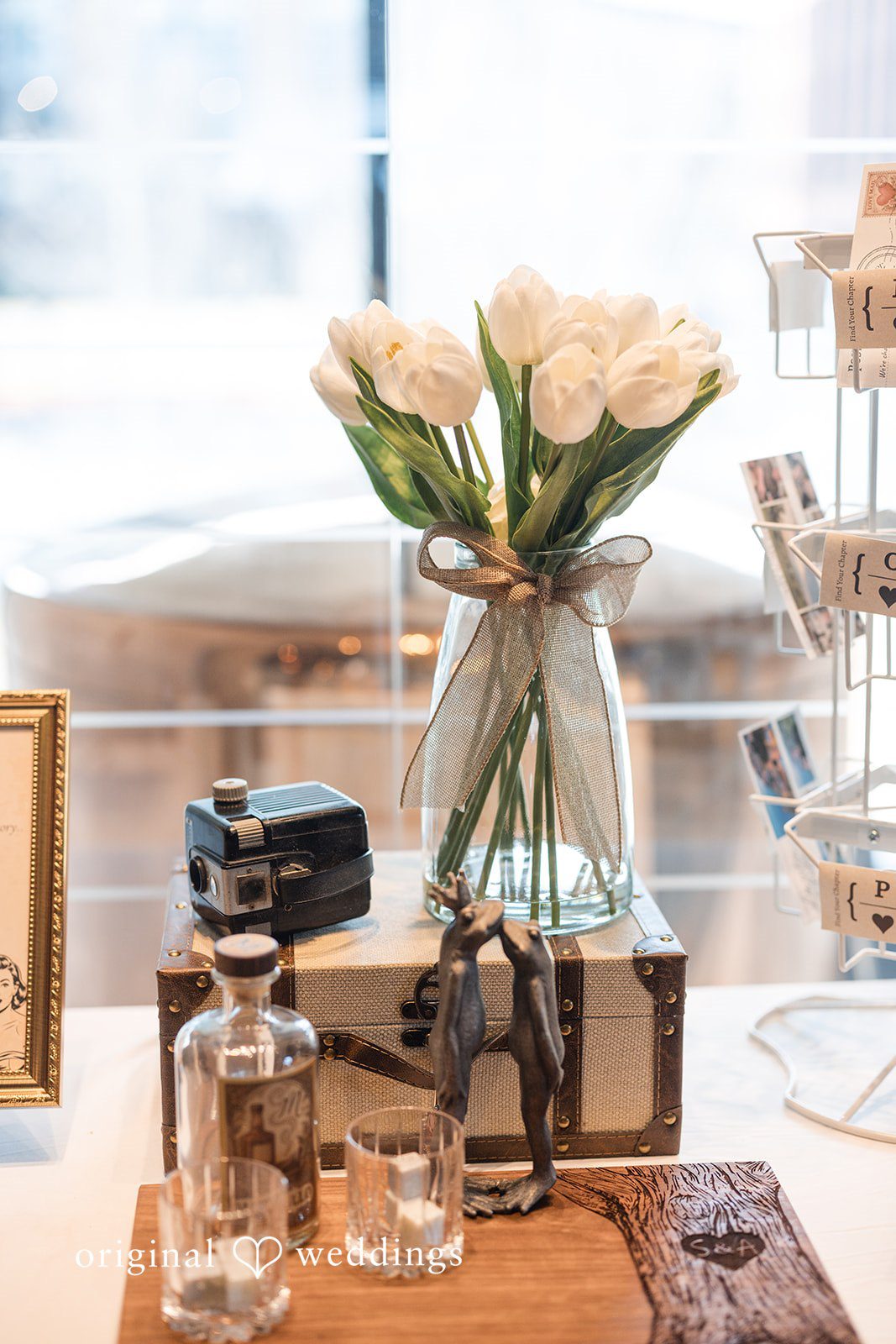 Elegant table vase with fresh flowers in reception decor