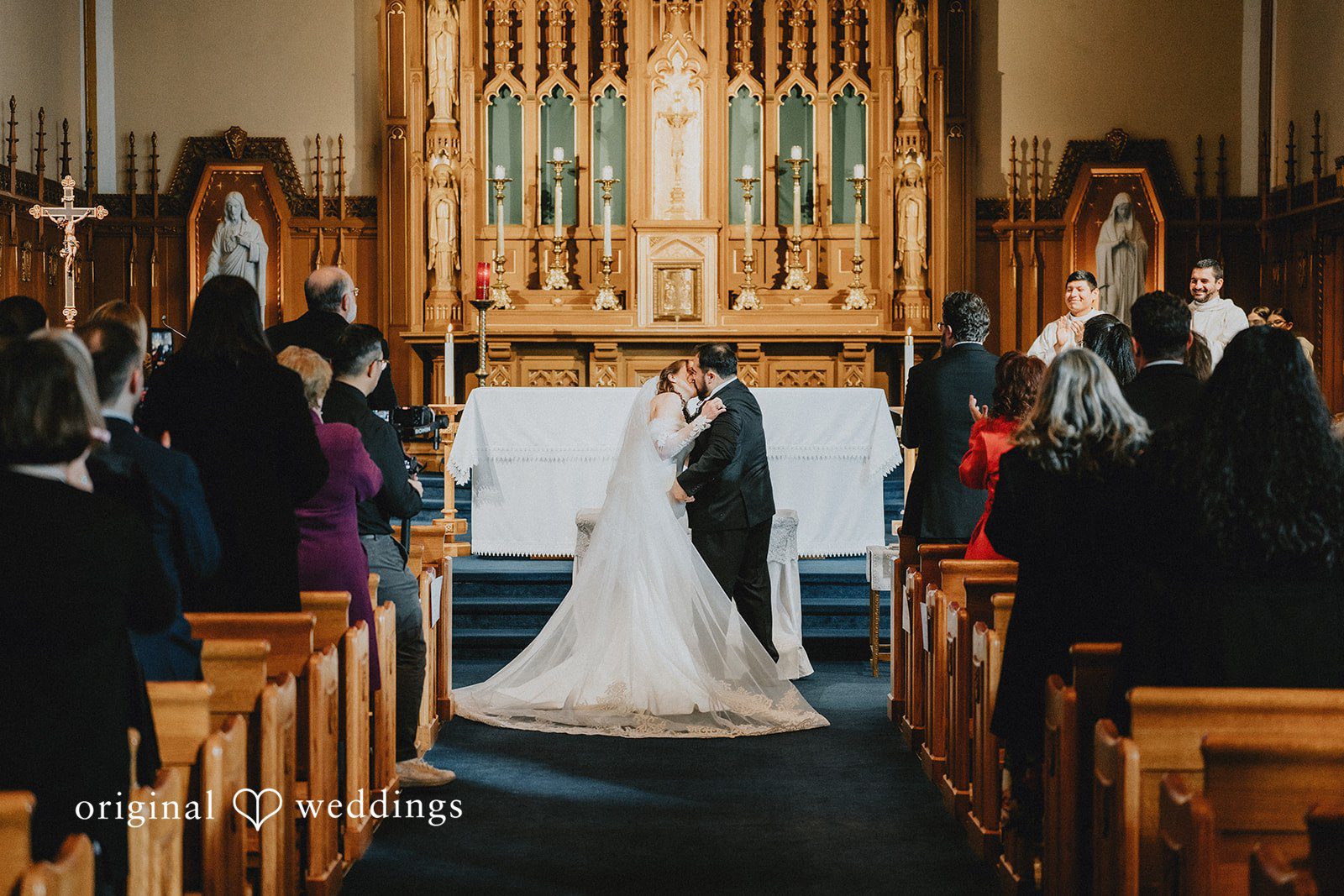 Mary + Ryan Romantic kiss moment of couple during ceremony