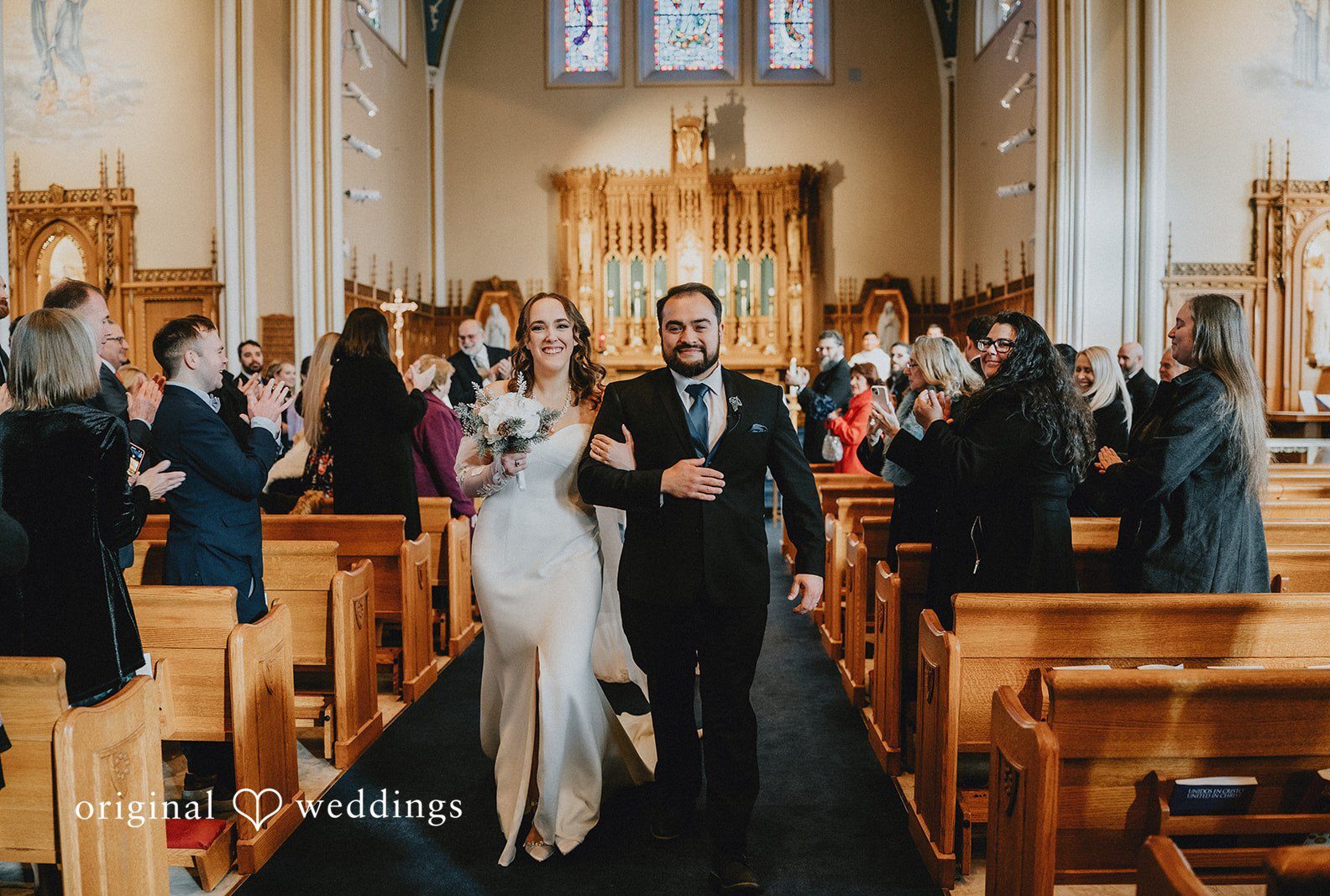 Couple leaving the altar after ceremony at Saphire Estate captured by Boston wedding photographers from original weddings