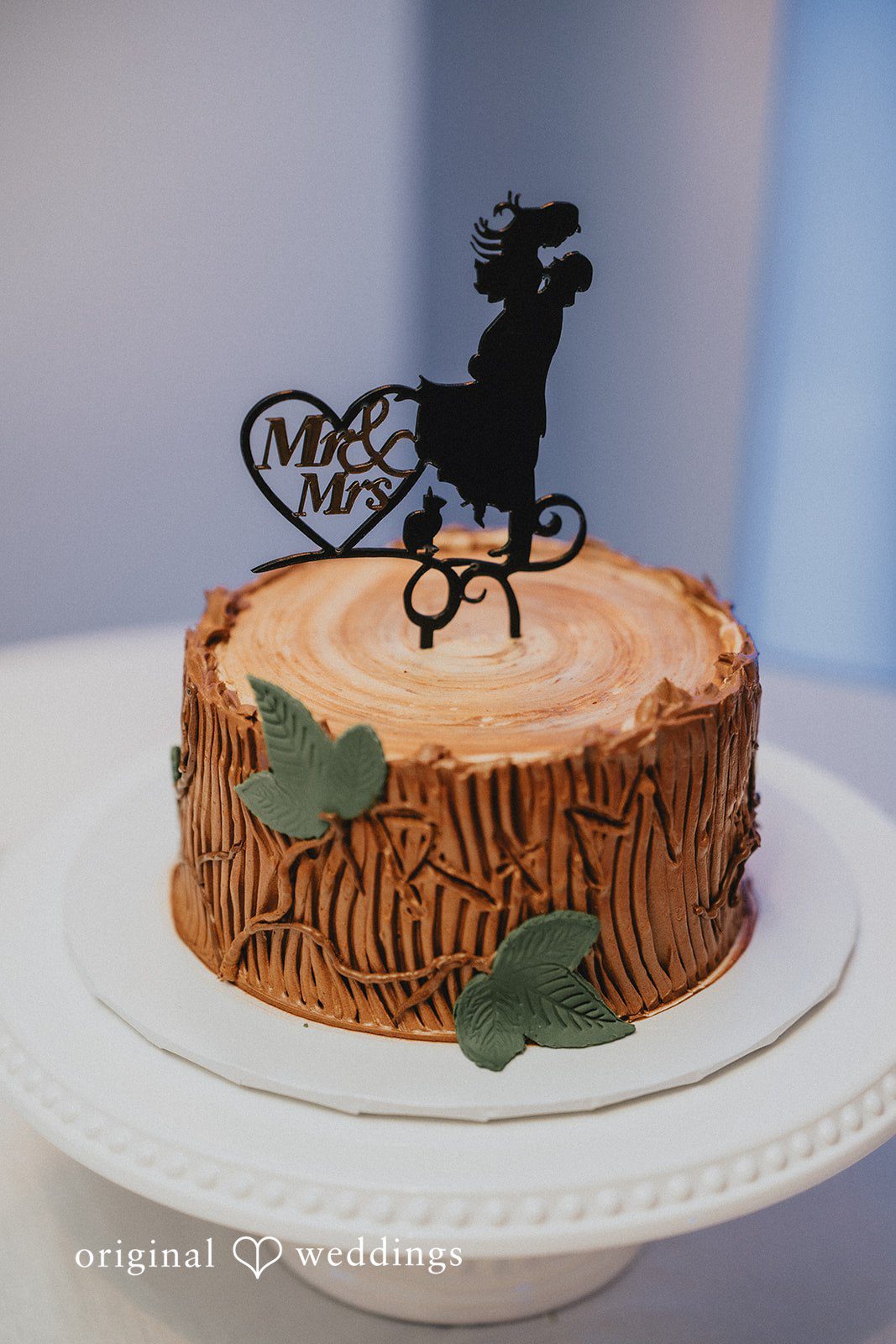 Mary + Ryan Lovely cake picture with couple topper on it