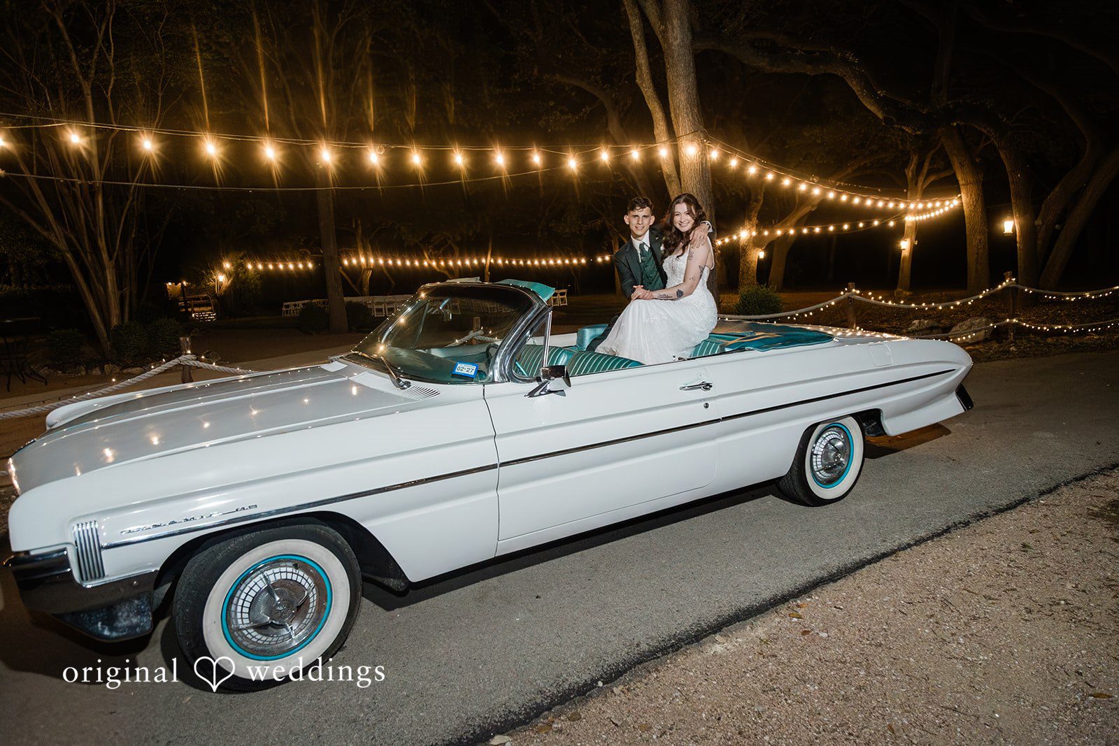 Gavin + Kayleigh A stylish portrait of the couple in their sleek white car